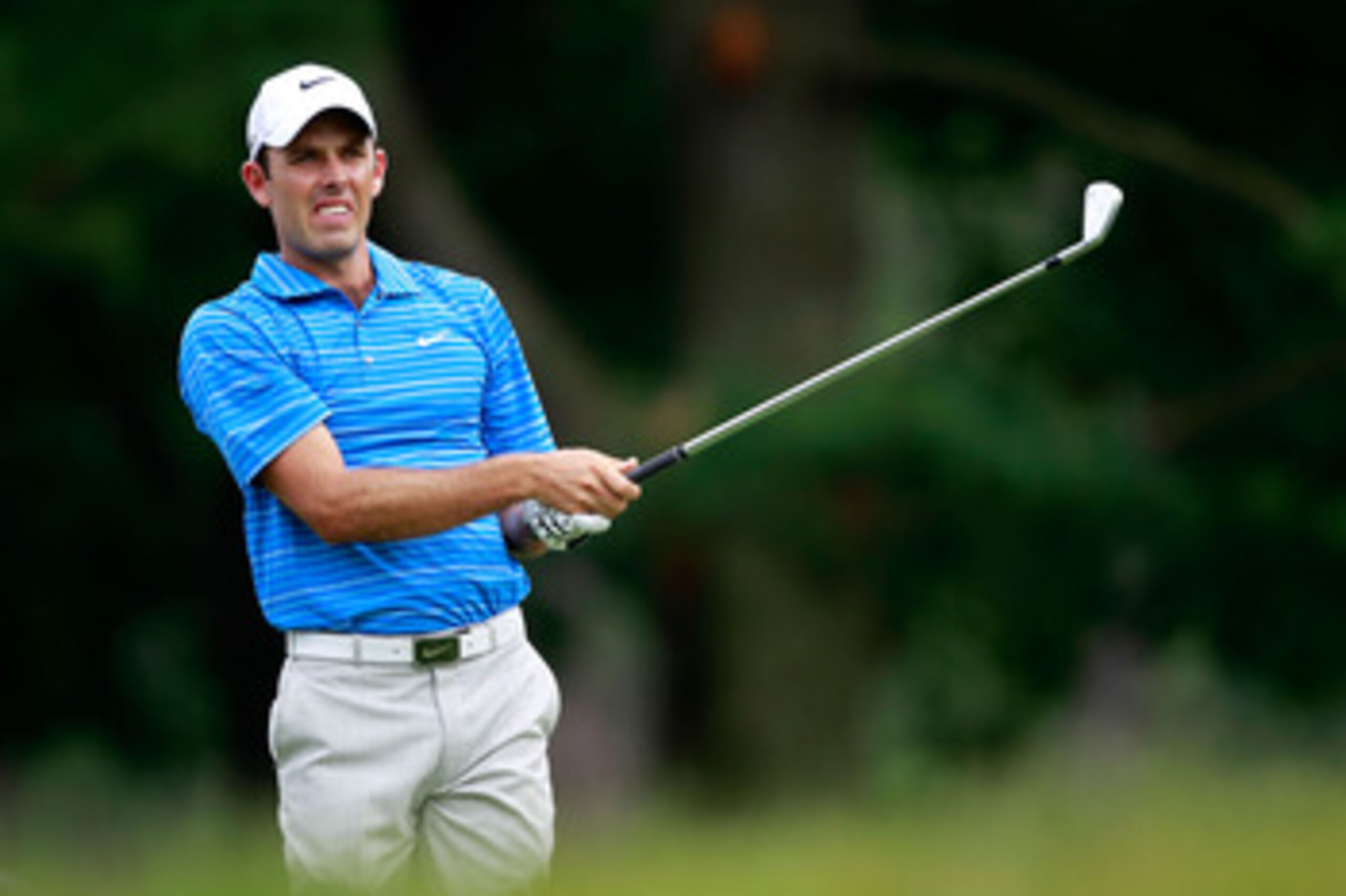 BETHESDA, MD - JUNE 16:  Charl Schwartzel of South Africa hits a shot on the second hole during the first round of the 111th U.S. Open at Congressional Country Club on June 16, 2011 in Bethesda, Maryland.  (Photo by Chris Trotman/Getty Images)