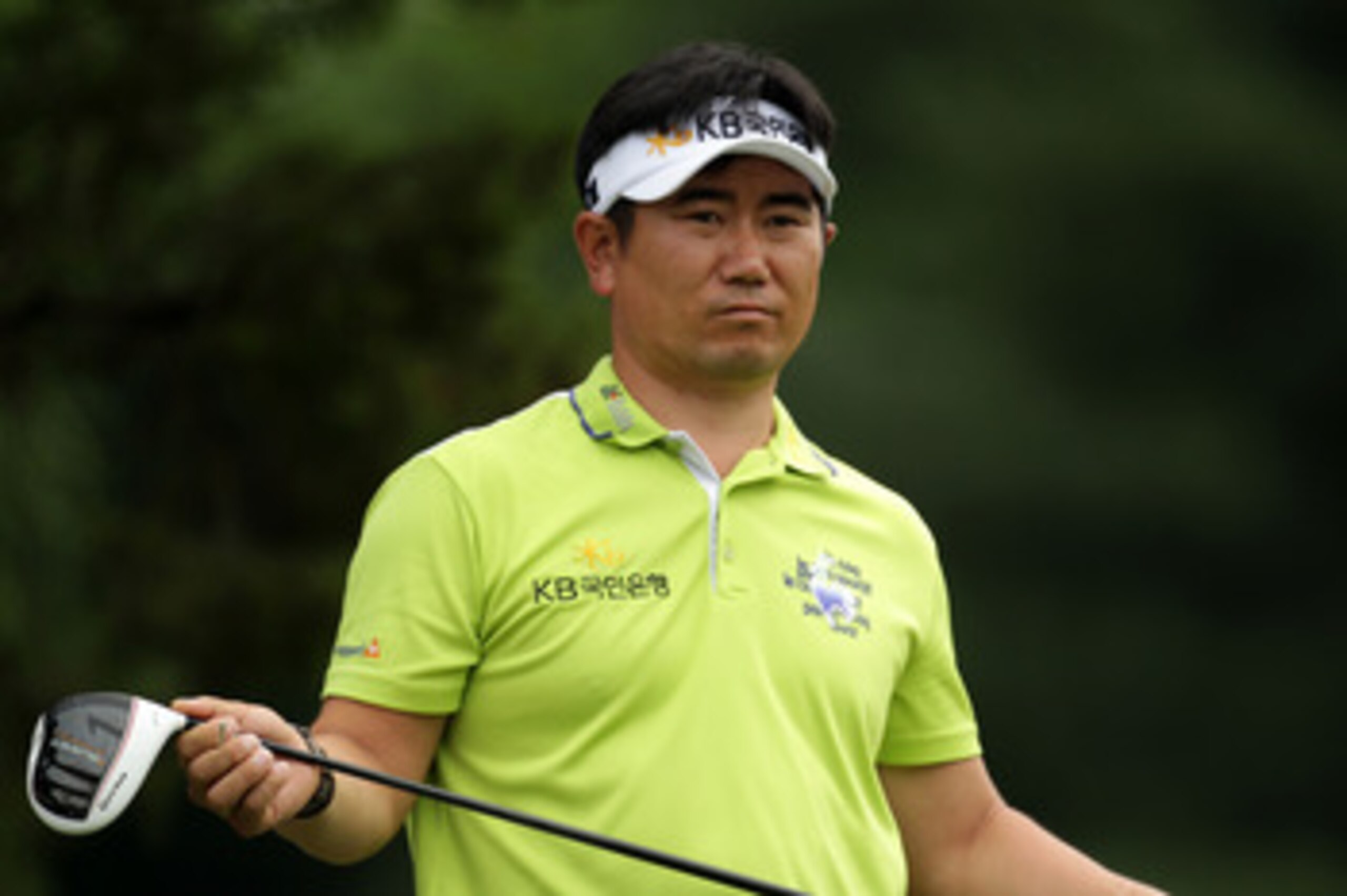 BETHESDA, MD - JUNE 16:  Y.E. Yang of South Korea watches his tee shot on the 14th hole during the first round of the 111th U.S. Open at Congressional Country Club on June 16, 2011 in Bethesda, Maryland.  (Photo by Ross Kinnaird/Getty Images)