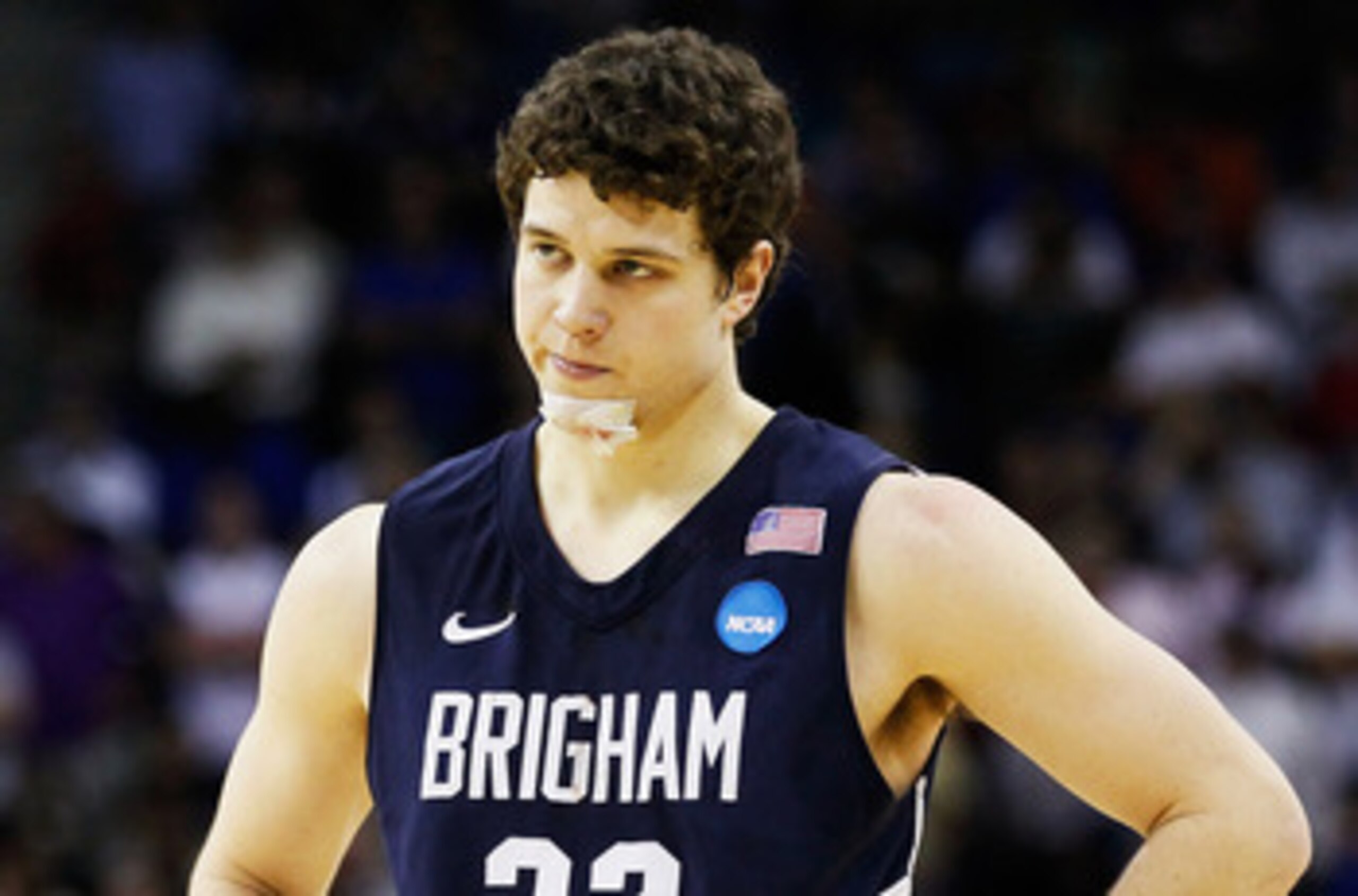 NEW ORLEANS, LA - MARCH 24:  Jimmer Fredette #32 of the Brigham Young Cougars reacts during their 74 to 83 loss to the Florida Gators in the Southeast regional of the 2011 NCAA men's basketball tournament at New Orleans Arena on March 24, 2011 in New Orle
