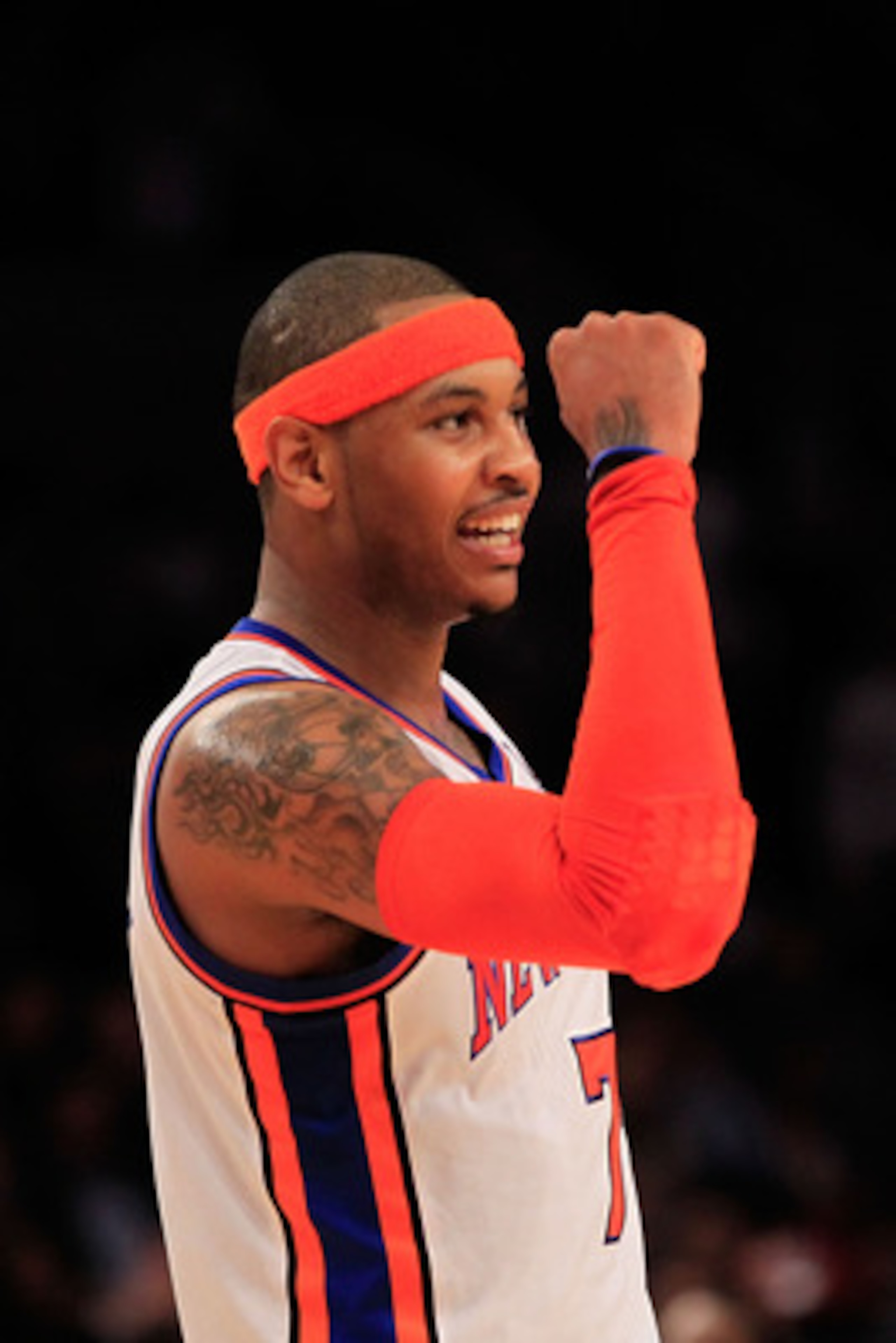 NEW YORK, NY - MARCH 30:  Carmelo Anthony #7 of the New York Knicks celebrates during the game against the New Jersey Nets at Madison Square Garden on March 30, 2011 in New York City. NOTE TO USER: User expressly acknowledges and agrees that, by downloadi