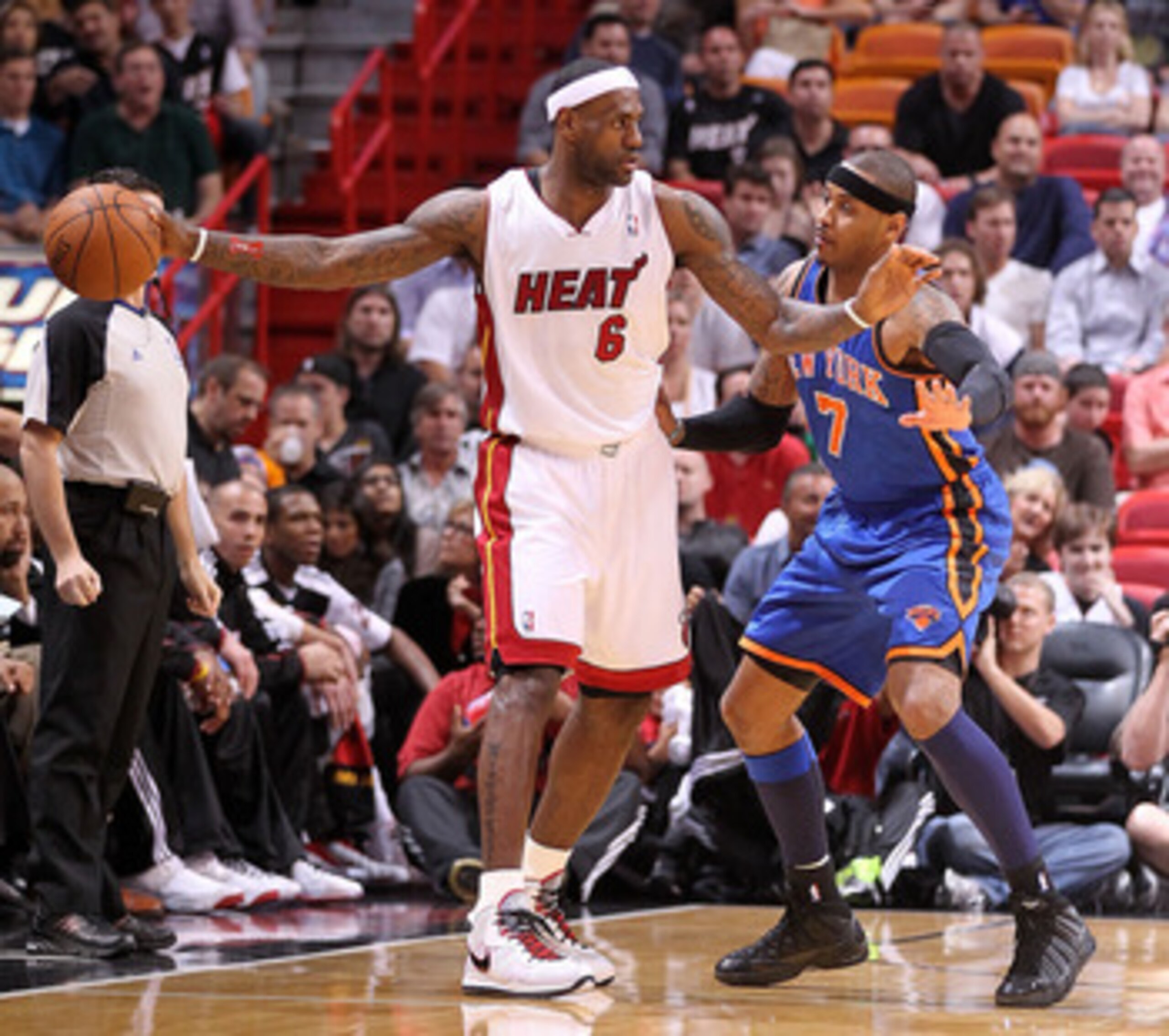 MIAMI, FL - FEBRUARY 27:  LeBron James #6 of the Miami Heat is guarded by Carmelo Anthony #7 of the New York Knicks looks on during a game at American Airlines Arena on February 27, 2011 in Miami, Florida. NOTE TO USER: User expressly acknowledges and agr
