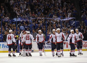 TAMPA, FL - MAY 04: The Washington Capitals line up to shake hands with the Tampa Bay Lightning following defeat in Game Four of the Eastern Conference Semifinals during the 2011 NHL Stanley Cup Playoffs at the St Pete Times Forum on May 4, 2011 in Tampa,