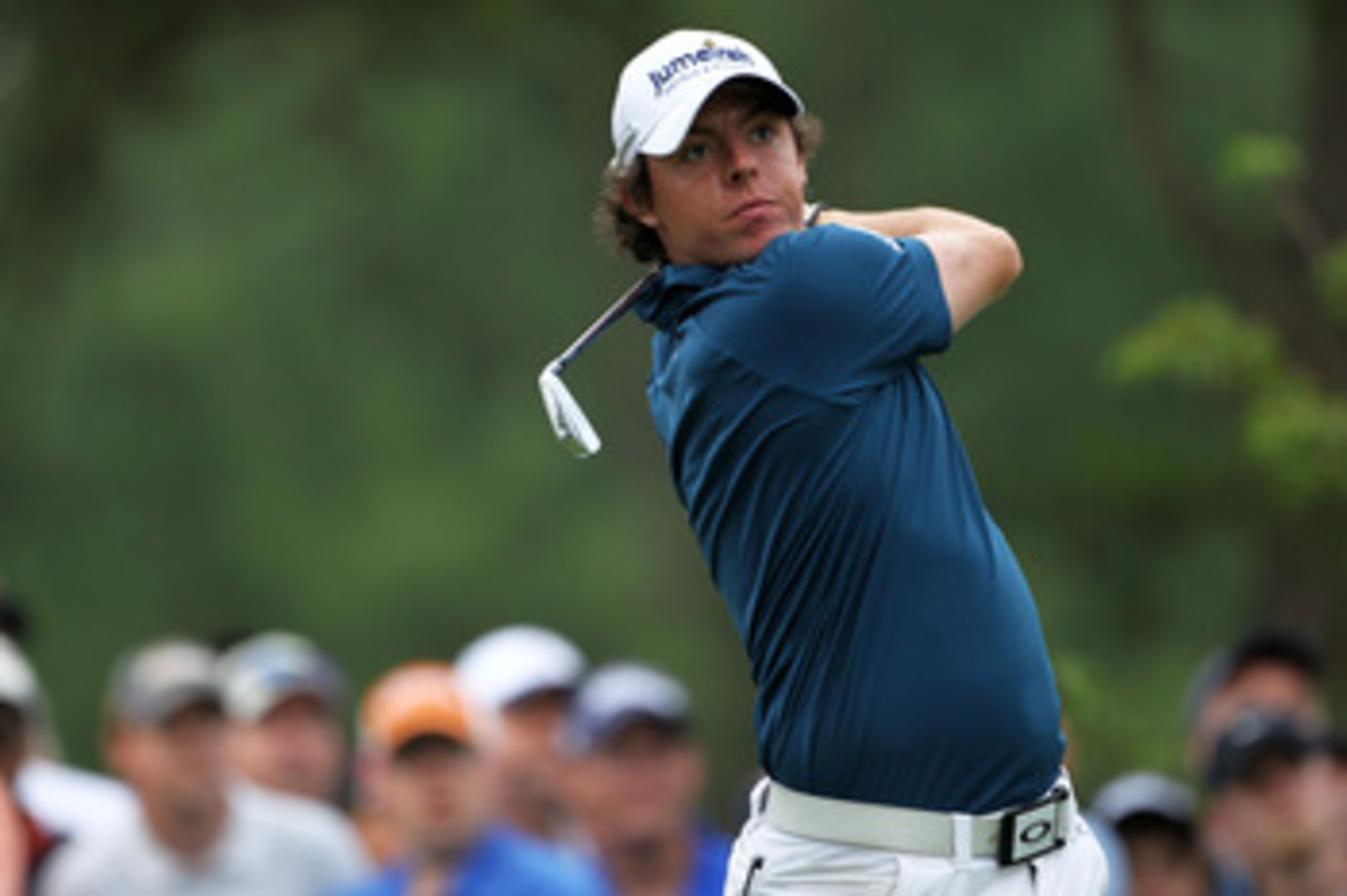 BETHESDA, MD - JUNE 16: Rory McIlroy of Northern Ireland watches his tee shot on the eighth hole during the first round of the 111th U.S. Open at Congressional Country Club on June 16, 2011 in Bethesda, Maryland. (Photo by Jamie Squire/Getty Images) BETHESDA, MD - JUNE 16: Rory McIlroy of Northern Ireland watches his tee shot on the eighth hole during the first round of the 111th U.S. Open at Congressional Country Club on June 16, 2011 in Bethesda, Maryland. (Photo by Jamie Squire/Getty Images)