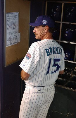 PHOENIX - APRIL 6:  Manager Bob Brenly #15 of the Arizona Diamondbacks watches the Opening Day game against the Colorado Rockies at Bank One Ballpark on April 6, 2004 in Phoenix, Arizona.  The Rockies defeated the Diamondbacks 6-2. (Photo by Barry Gossage
