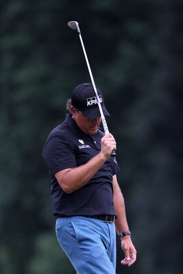 BETHESDA, MD - JUNE 16:  Phil Mickelson reacts to missing a chip shot on the 18th hole during the first round of the 111th U.S. Open at Congressional Country Club on June 16, 2011 in Bethesda, Maryland.  (Photo by Jamie Squire/Getty Images)