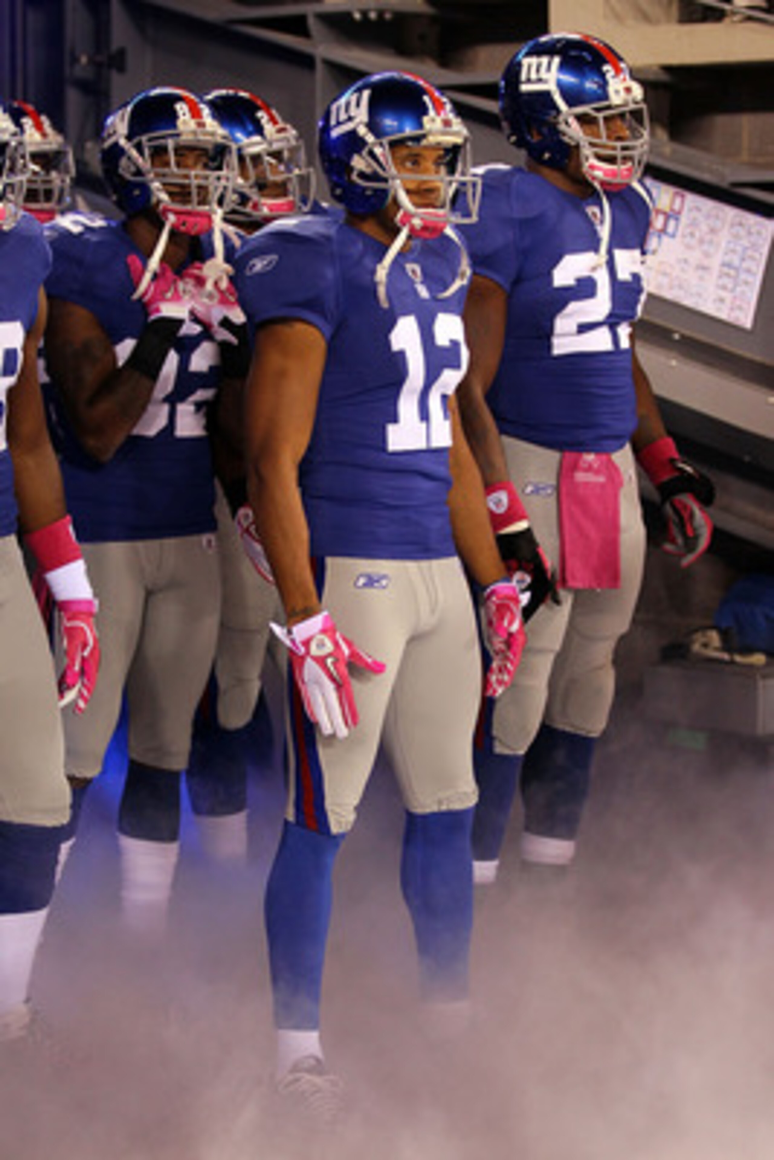 EAST RUTHERFORD, NJ - OCTOBER 03:  Mario Manningham #82, Steve Smith #12 and Brandon Jacobs #27 of the New York Giants are introduced before playing against the Chicago Bears at New Meadowlands Stadium on October 3, 2010 in East Rutherford, New Jersey.  (