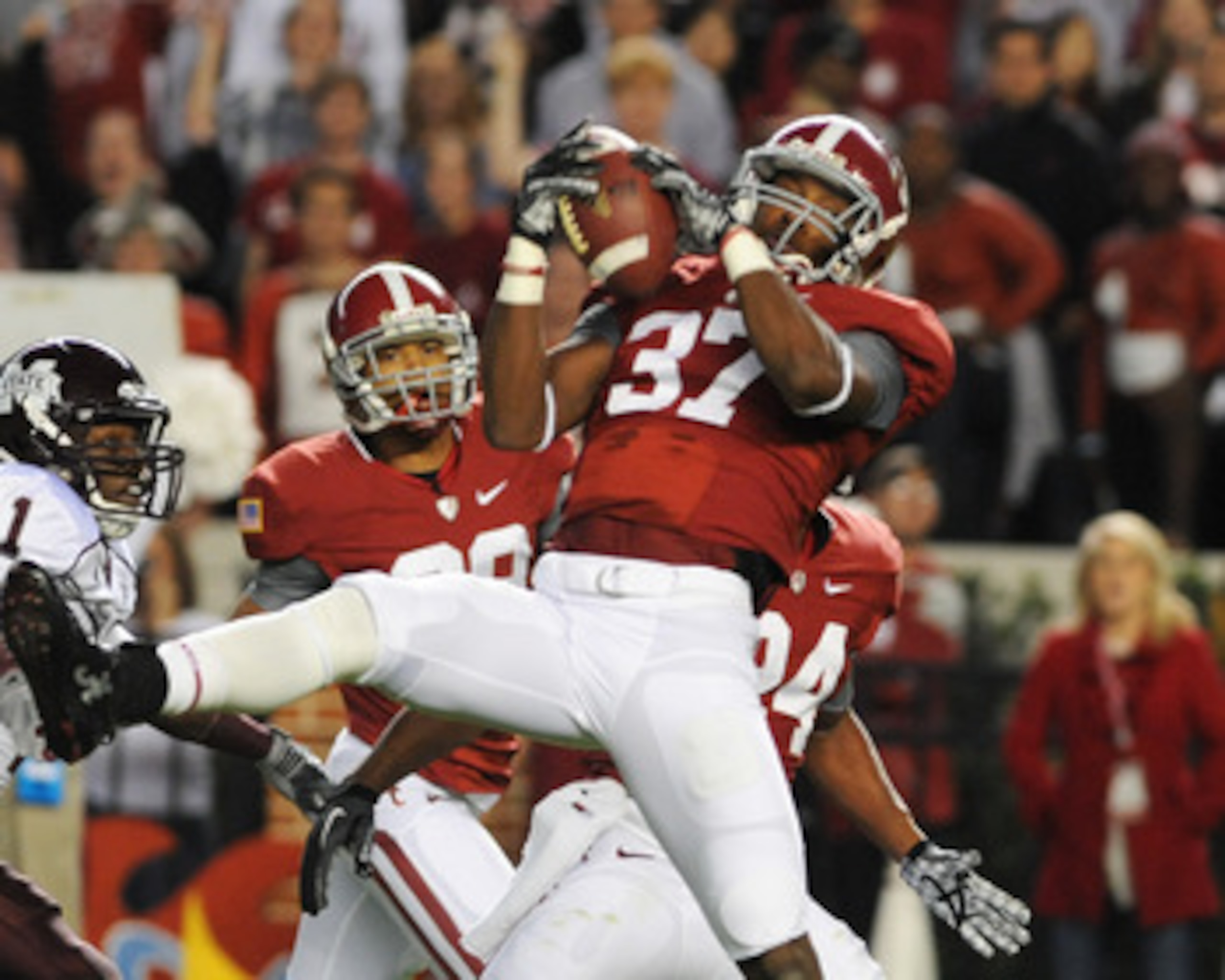 TUSCALOOSA, AL - NOVEMBER 13: Defensive back Robert Lester #37 of the Alabama Crimson Tide intercepts a pass against the Mississippi State Bulldogs November 13, 2010 at Bryant-Denny Stadium in Tuscaloosa, Alabama.  (Photo by Al Messerschmidt/Getty Images)