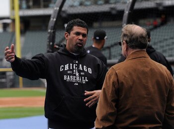 CHICAGO, IL - JUNE 11: Ozzie Guillen #13 of the Chicago White Sox (L)  talks with White Sox owner Jerry Reinsdorf  before the game against the Oakland Athletics on June 11, 2011 at U.S. Cellular Field in Chicago, Illinois.  (Photo by David Banks/Getty Ima