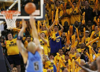OAKLAND, CA - MAY 11:  Fans of the Golden State Warriors celebrate against the Utah Jazz in Game Three of the Western Conference Semifinals during the 2007 NBA Playoffs at Oracle Arena May 11, 2007 in Oakland, California. NOTE TO USER: User expressly ackn