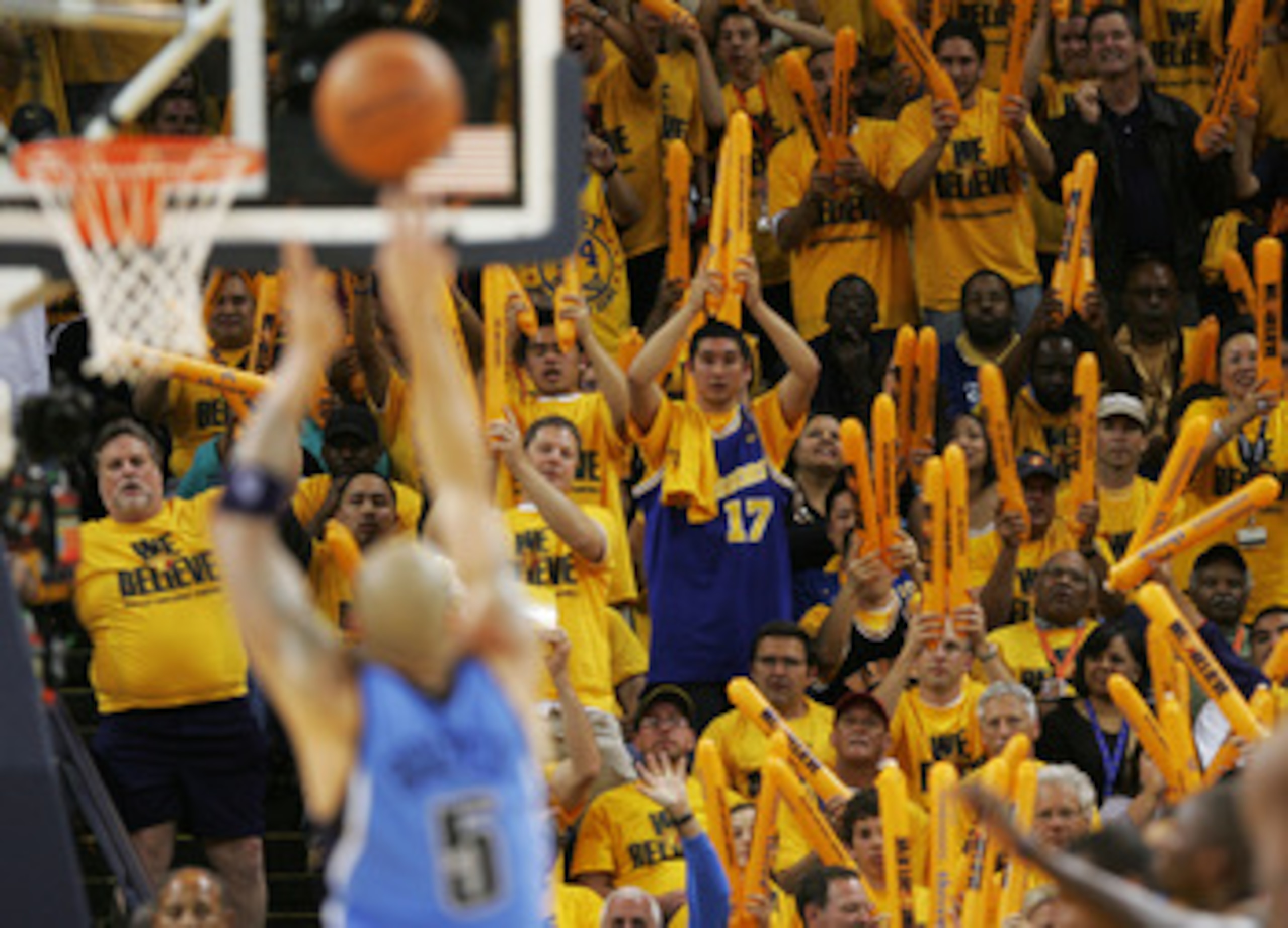 OAKLAND, CA - MAY 11:  Fans of the Golden State Warriors celebrate against the Utah Jazz in Game Three of the Western Conference Semifinals during the 2007 NBA Playoffs at Oracle Arena May 11, 2007 in Oakland, California. NOTE TO USER: User expressly ackn