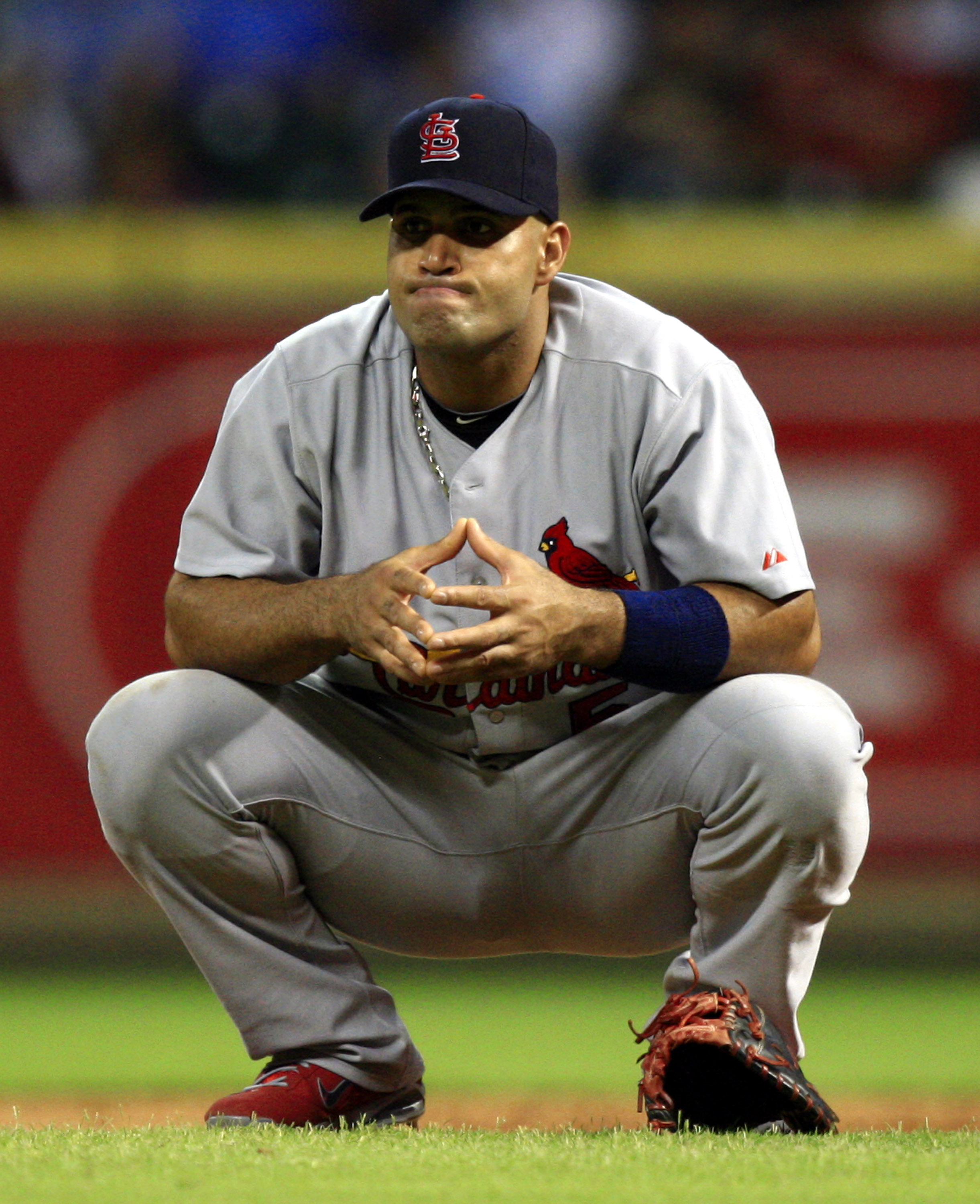 HOUSTON - JUNE 07:  First baseman Albert Pujols #5 of the St. Louis Cardinals takes a break during a pitching change against the Houston Astros at Minute Maid Park on June 7, 2011 in Houston, Texas.  (Photo by Bob Levey/Getty Images)