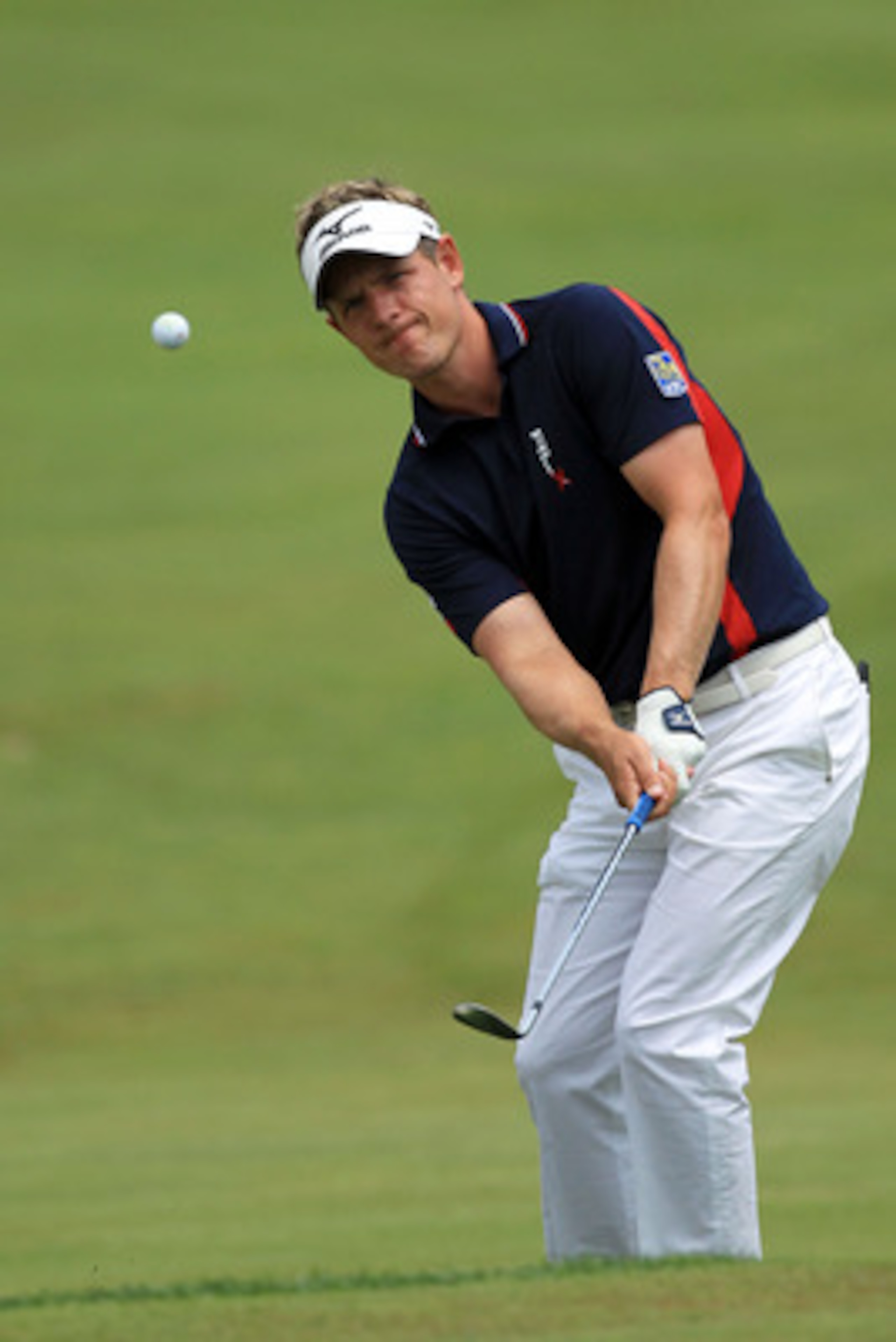 BETHESDA, MD - JUNE 16: Luke Donald of England hits a shot on the fifth hole during the first round of the 111th U.S. Open at Congressional Country Club on June 16, 2011 in Bethesda, Maryland. (Photo by David Cannon/Getty Images) BETHESDA, MD - JUNE 16: Luke Donald of England hits a shot on the fifth hole during the first round of the 111th U.S. Open at Congressional Country Club on June 16, 2011 in Bethesda, Maryland. (Photo by David Cannon/Getty Images)