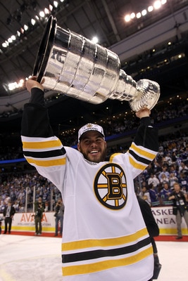 VANCOUVER, BC - JUNE 15:  Nathan Horton #18 of the Boston Bruins celebrates with the Stanley Cup after defeating the Vancouver Canucks in Game Seven of the 2011 NHL Stanley Cup Final at Rogers Arena on June 15, 2011 in Vancouver, British Columbia, Canada.