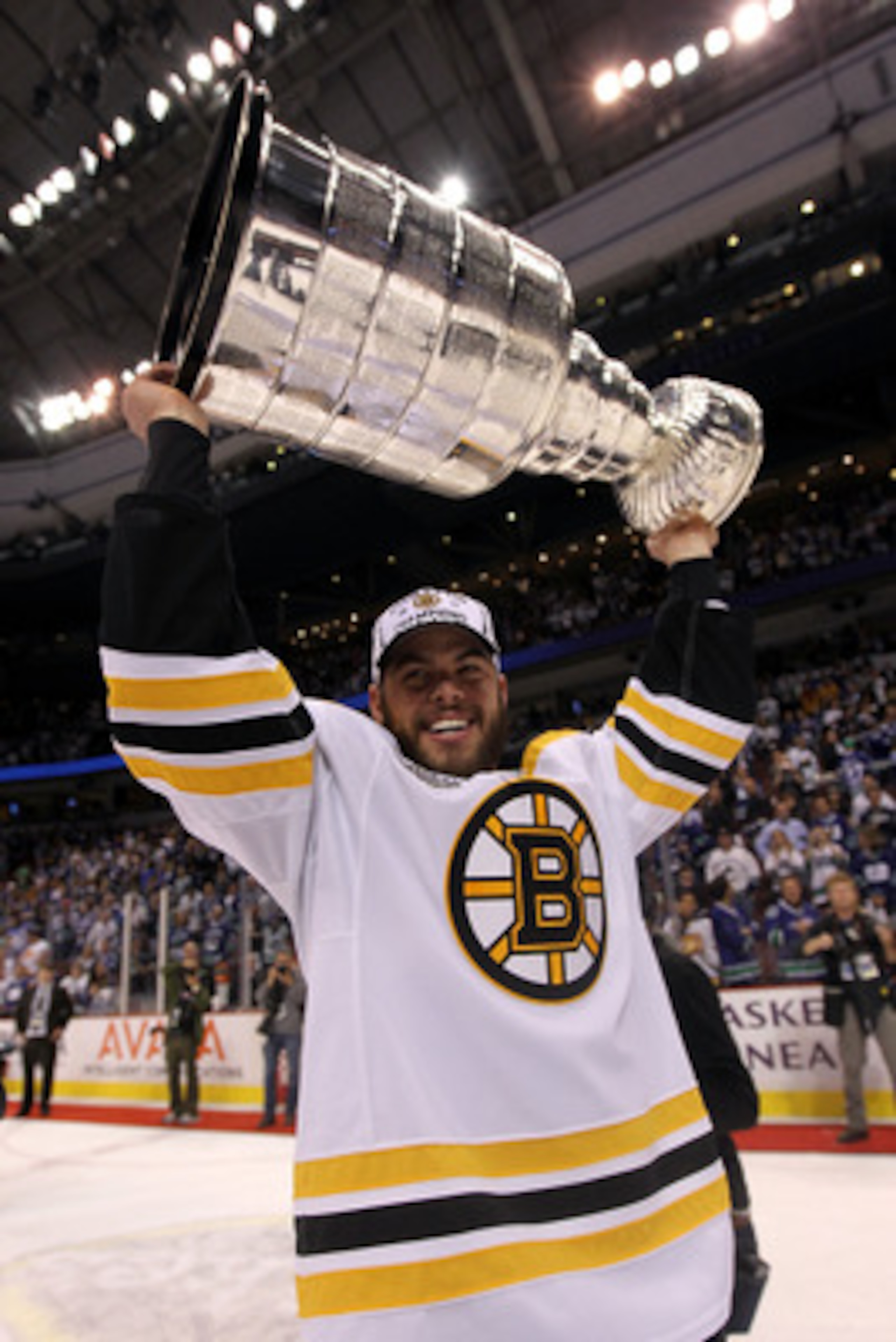 VANCOUVER, BC - JUNE 15: Nathan Horton #18 of the Boston Bruins celebrates with the Stanley Cup after defeating the Vancouver Canucks in Game Seven of the 2011 NHL Stanley Cup Final at Rogers Arena on June 15, 2011 in Vancouver, British Columbia, Canada. VANCOUVER, BC - JUNE 15: Nathan Horton #18 of the Boston Bruins celebrates with the Stanley Cup after defeating the Vancouver Canucks in Game Seven of the 2011 NHL Stanley Cup Final at Rogers Arena on June 15, 2011 in Vancouver, British Columbia, Canada.