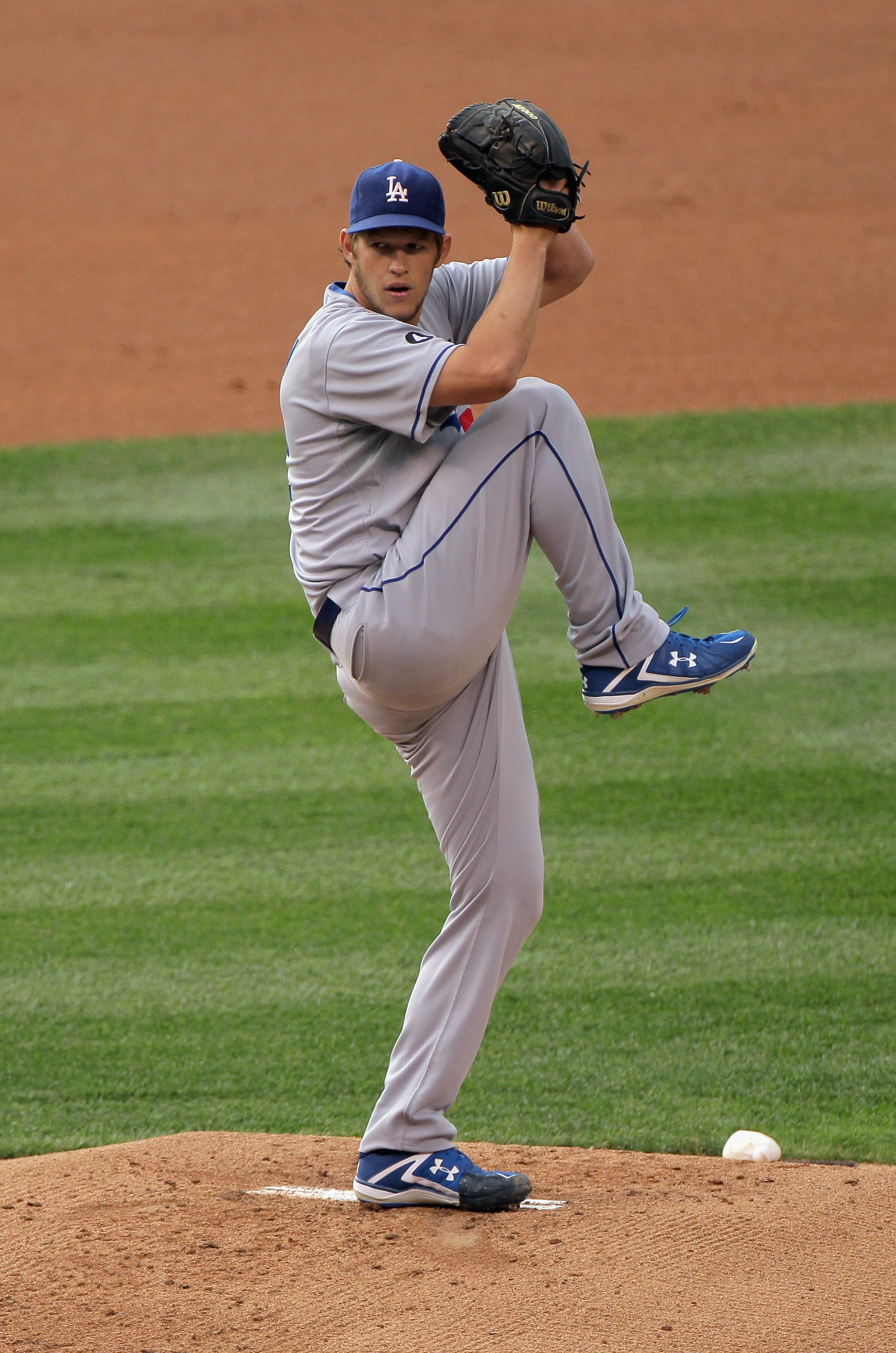 DENVER, CO - JUNE 09:  Starting pitcher Clayton Kershaw #22 of the Los Angeles Dodgers delivers against the Colorado Rockies at Coors Field on June 9, 2011 in Denver, Colorado.  (Photo by Doug Pensinger/Getty Images)