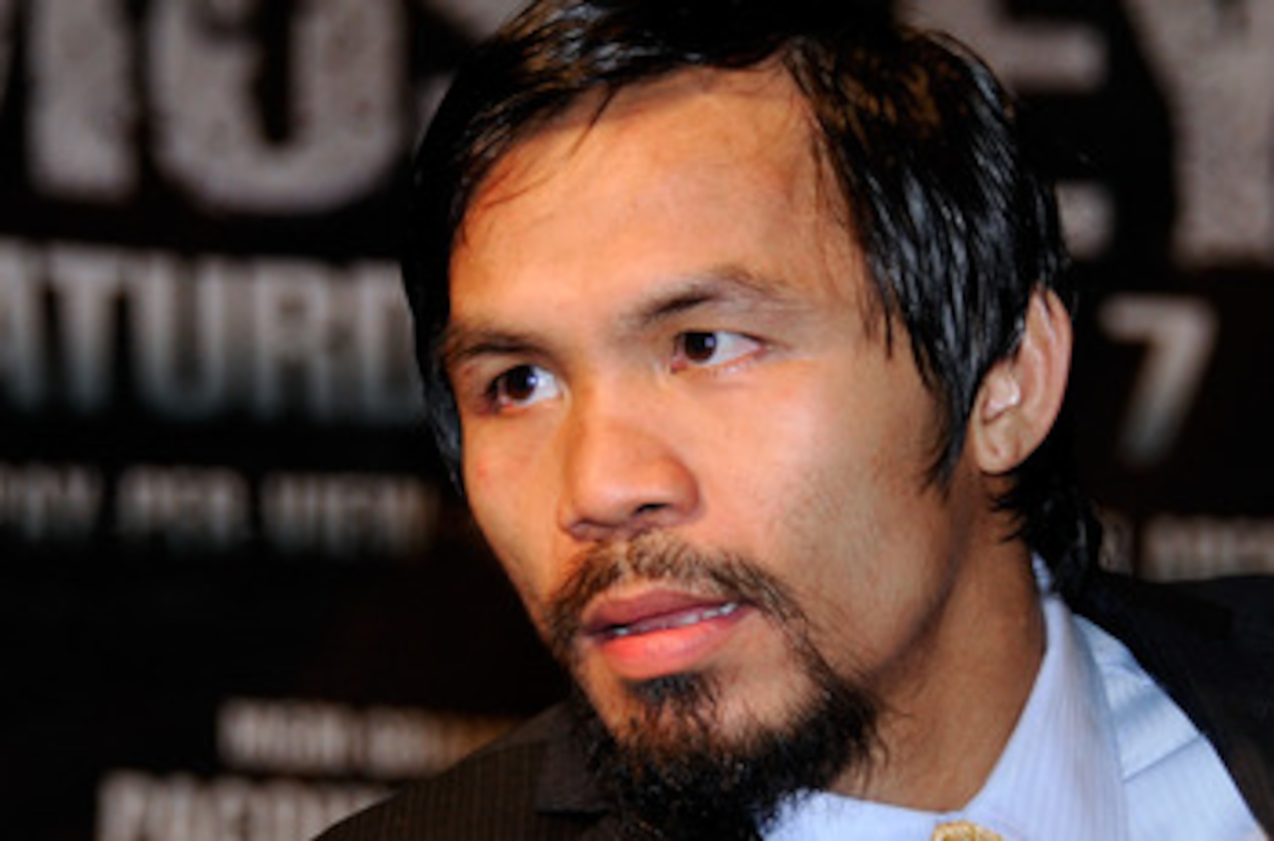 LAS VEGAS, NV - MAY 07: Boxer Manny Pacquiao listens to a question at a post-fight news conference after he defeated Shane Mosley by unanimous decision to retain his WBO welterweight title at the MGM Grand Garden Arena May 7, 2011 in Las Vegas, Nevada. LAS VEGAS, NV - MAY 07: Boxer Manny Pacquiao listens to a question at a post-fight news conference after he defeated Shane Mosley by unanimous decision to retain his WBO welterweight title at the MGM Grand Garden Arena May 7, 2011 in Las Vegas, Nevada.
