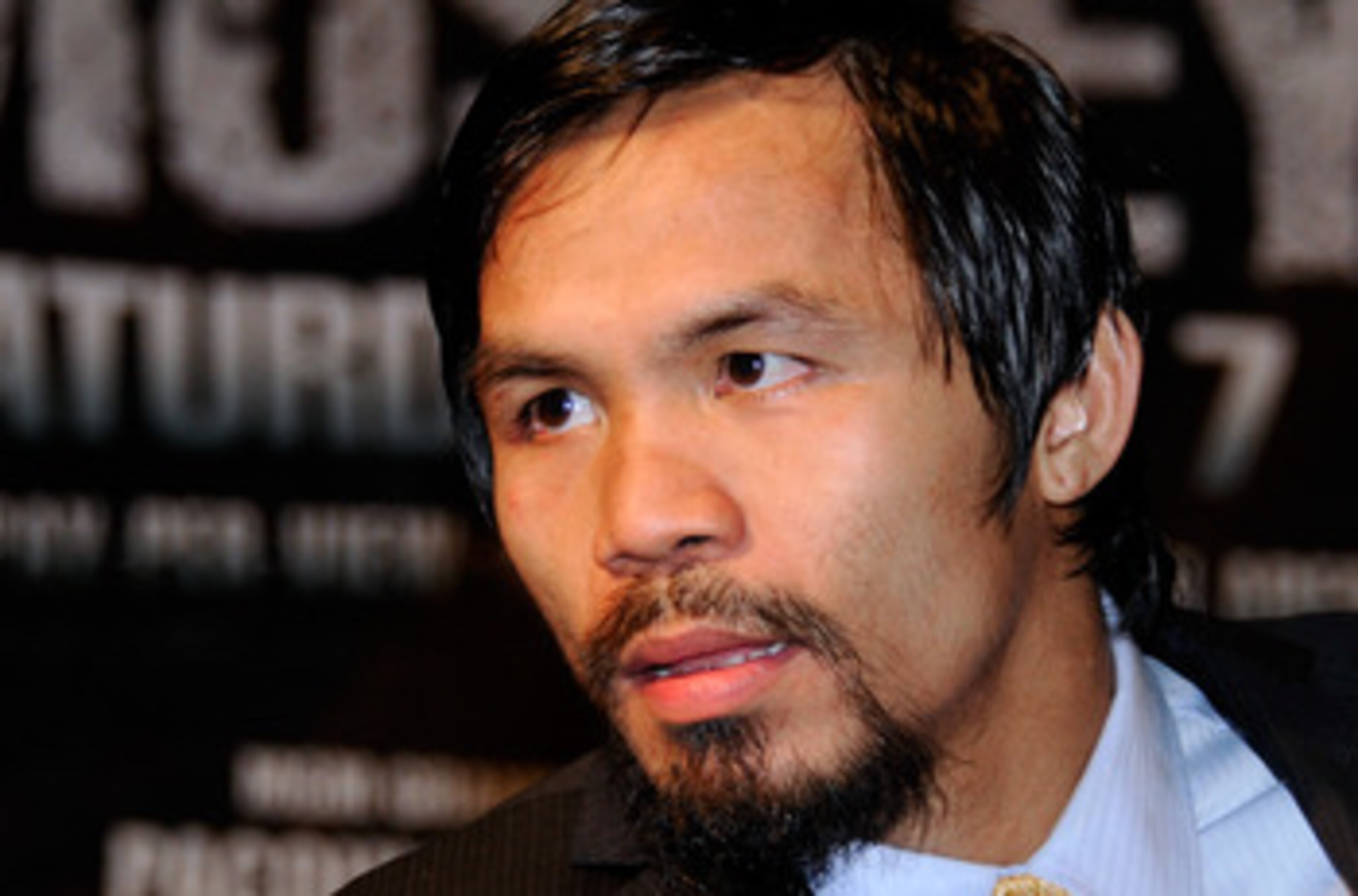 LAS VEGAS, NV - MAY 07:  Boxer Manny Pacquiao listens to a question at a post-fight news conference after he defeated Shane Mosley by unanimous decision to retain his WBO welterweight title at the MGM Grand Garden Arena May 7, 2011 in Las Vegas, Nevada.
