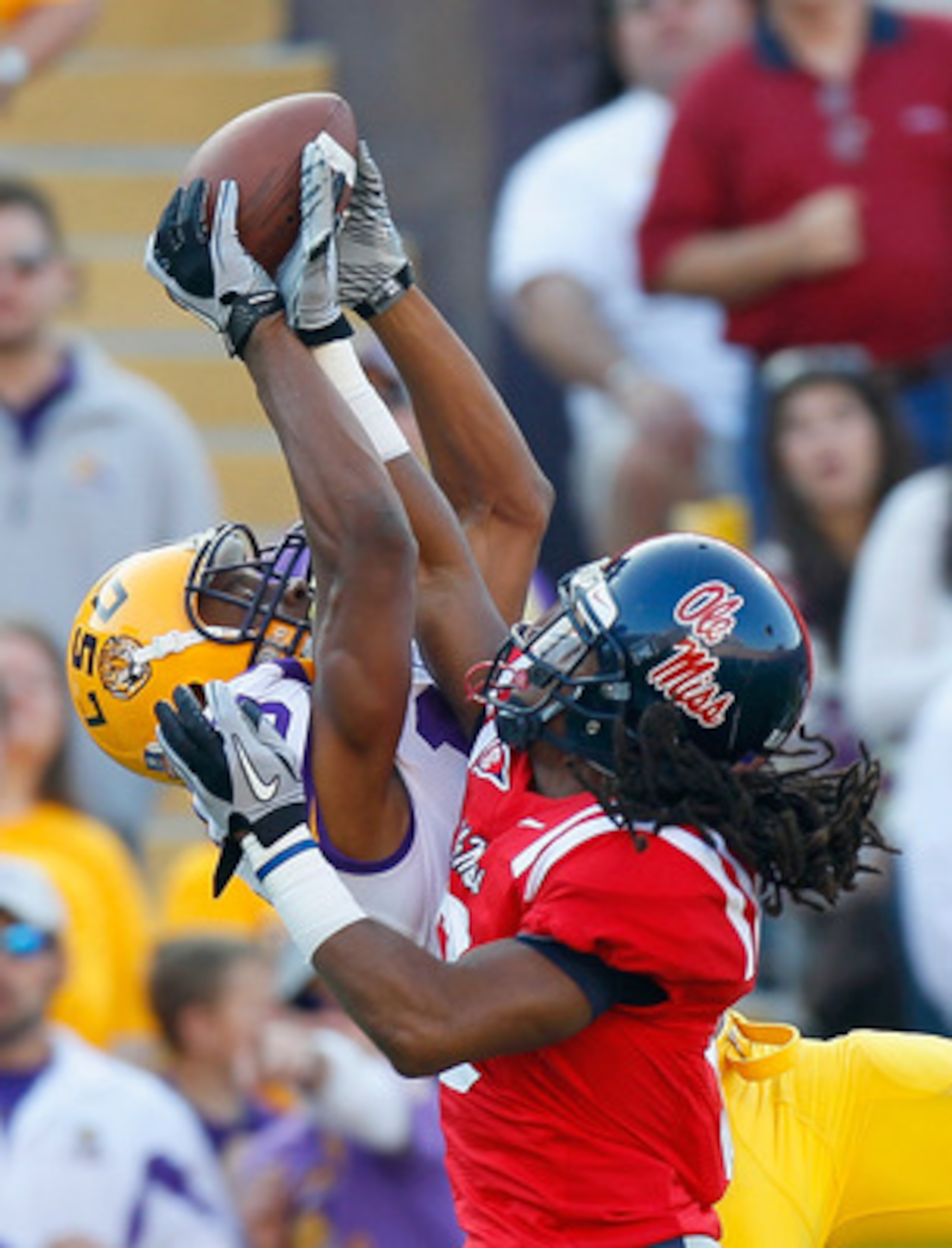 BATON ROUGE, LA - NOVEMBER 20:  Charles Sawyer #3 of the Ole Miss Rebels breaks up a reception intended for Russell Shepard #10 of the Louisiana State University Tigers at Tiger Stadium on November 20, 2010 in Baton Rouge, Louisiana.  (Photo by Kevin C. C