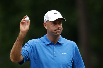 BETHESDA, MD - JUNE 16:  Stewart Cink waves to the gallery after a birdie during the first round of the 111th U.S. Open at Congressional Country Club on June 16, 2011 in Bethesda, Maryland.  (Photo by Ross Kinnaird/Getty Images)