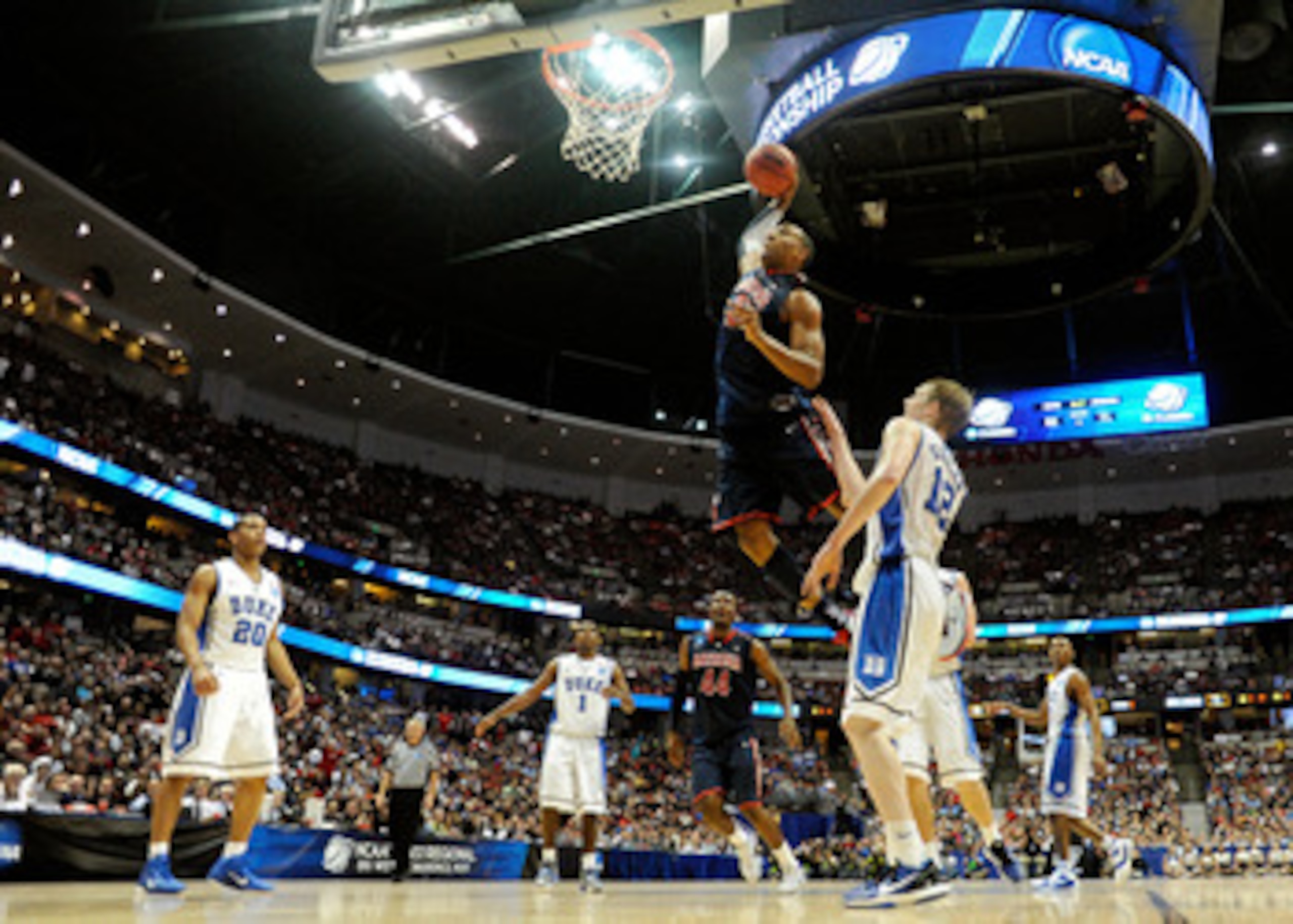 ANAHEIM, CA - MARCH 24: Derrick Williams #23 of the Arizona Wildcats dunks the over Kyle Singler #12 of the Duke Blue Devils during the west regional semifinal of the 2011 NCAA men's basketball tournament at the Honda Center on March 24, 2011 in Anaheim, ANAHEIM, CA - MARCH 24: Derrick Williams #23 of the Arizona Wildcats dunks the over Kyle Singler #12 of the Duke Blue Devils during the west regional semifinal of the 2011 NCAA men's basketball tournament at the Honda Center on March 24, 2011 in Anaheim,