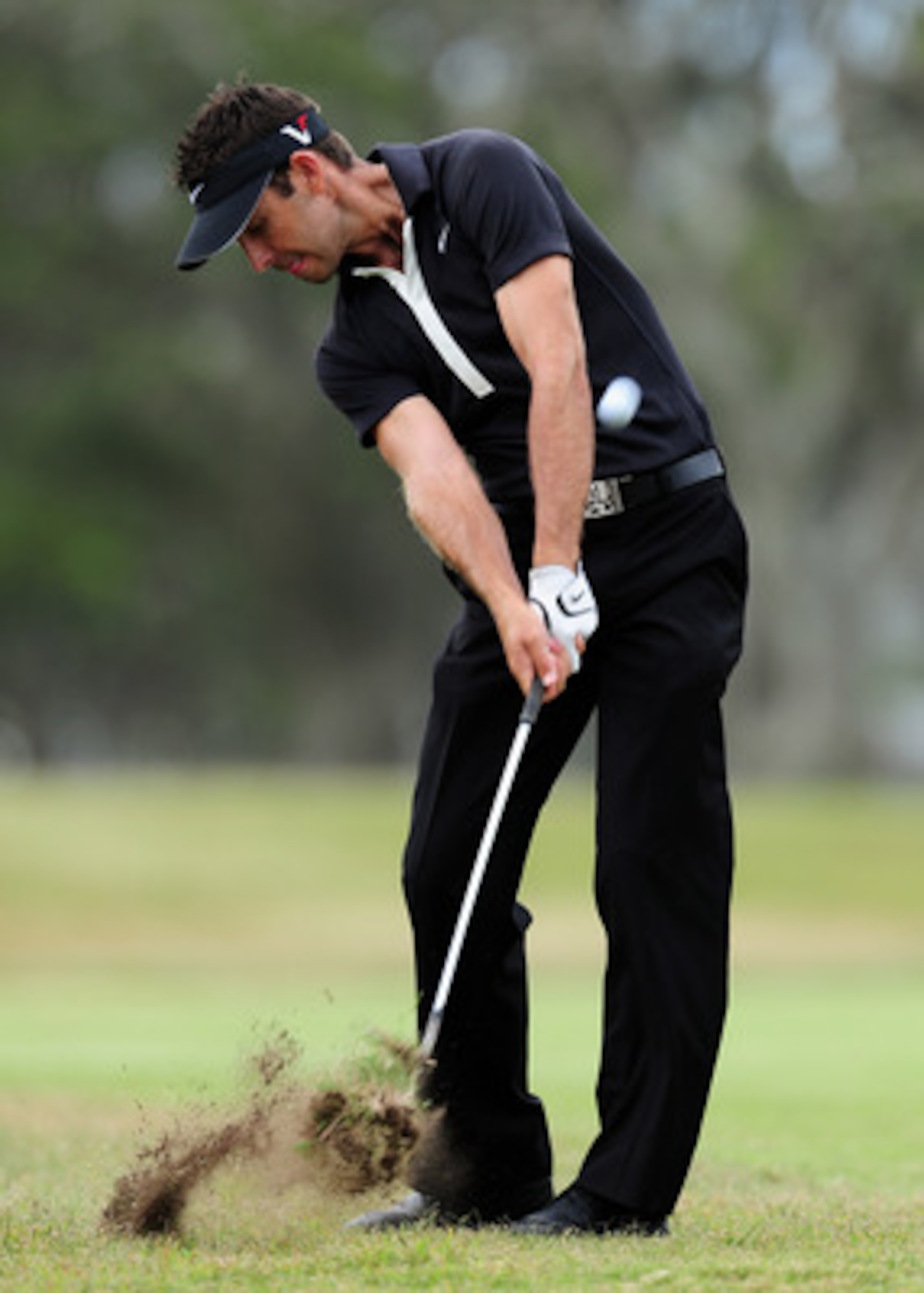 EAST LONDON, SOUTH AFRICA - JANUARY 10: Charl Schwartzel of South Africa plays his approach shot on the 16th hole during the final round of the Africa Open at the East London Golf Club on January 10, 2010 in East London, South Africa. (Photo by Stuart F EAST LONDON, SOUTH AFRICA - JANUARY 10: Charl Schwartzel of South Africa plays his approach shot on the 16th hole during the final round of the Africa Open at the East London Golf Club on January 10, 2010 in East London, South Africa. (Photo by Stuart F