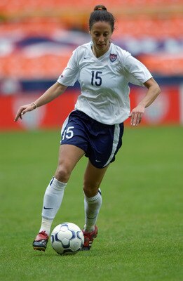 WASHINGTON - APRIL 26:  Defender Kate Sobrero #15 of the USA dribbles against Canada during the international women's soccer friendly at RFK Stadium on April 26, 2003 in Washington, DC. The USA defeated Canada 6-1. (Photo by Doug Pensinger/Getty Images)