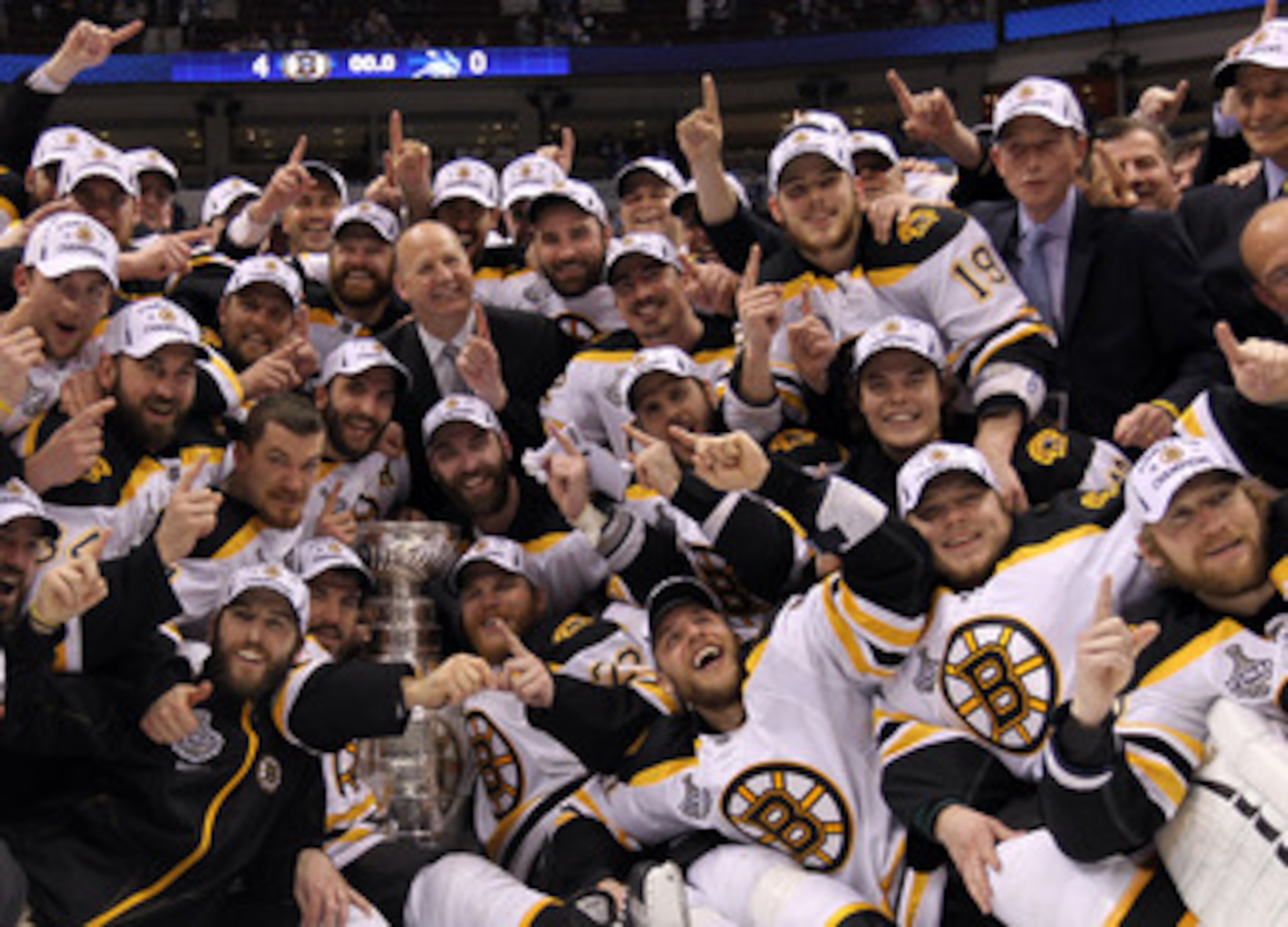 VANCOUVER, BC - JUNE 15:  The Boston Bruins pose with the Stanley Cup after defeating the Vancouver Canucks in Game Seven of the 2011 NHL Stanley Cup Final at Rogers Arena on June 15, 2011 in Vancouver, British Columbia, Canada. The Boston Bruins defeated