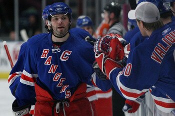 NEW YORK - MARCH 25:  Jaromir Jagr #68 of the New York Rangers is congratulated by team mates after scoring a goal against the Philadelphia Flyers during their game on March 25, 2008 at Madison Square Garden in New York City.  (Photo by Chris McGrath/Gett