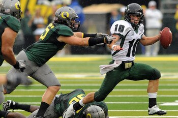 EUGENE, OR - SEPTEMBER 18: Quarterback Connor Kavanaugh #10 of the Portland State sacked by linebacker Casey Matthews #55 of the Oregon Ducks in the second quarter of the game at Autzen Stadium on September 18, 2010 in Eugene, Oregon.  (Photo by Steve Dyk