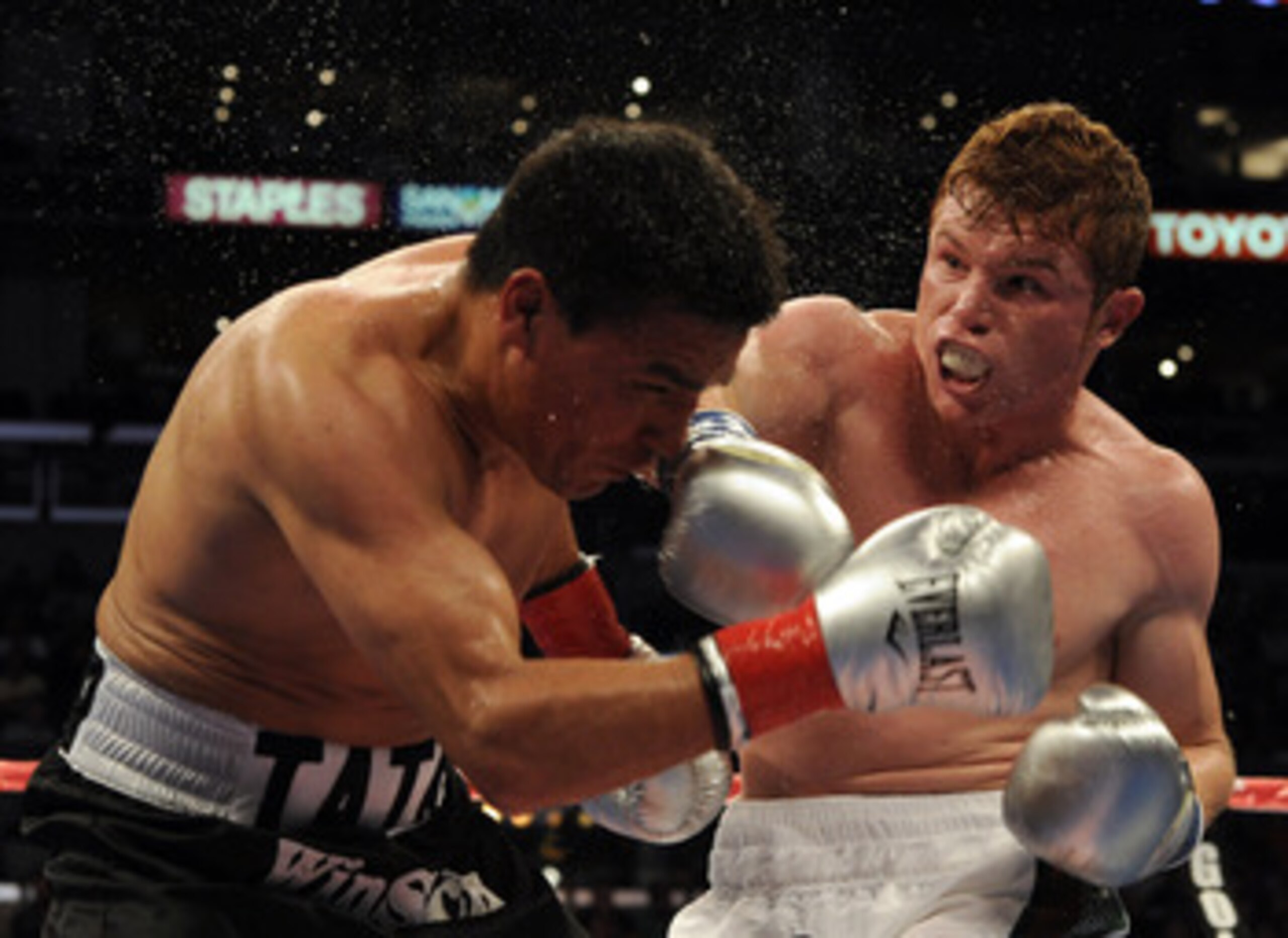 LOS ANGELES, CA - SEPTEMBER 18: Saul Alvarez of Mexico hits Carlos Baldomir of Argentina in the WBC Super Welterweight Silver Title fight at Staples Center on September 18, 2010 in Los Angeles, California. (Photo by Harry How/Getty Images) LOS ANGELES, CA - SEPTEMBER 18: Saul Alvarez of Mexico hits Carlos Baldomir of Argentina in the WBC Super Welterweight Silver Title fight at Staples Center on September 18, 2010 in Los Angeles, California. (Photo by Harry How/Getty Images)