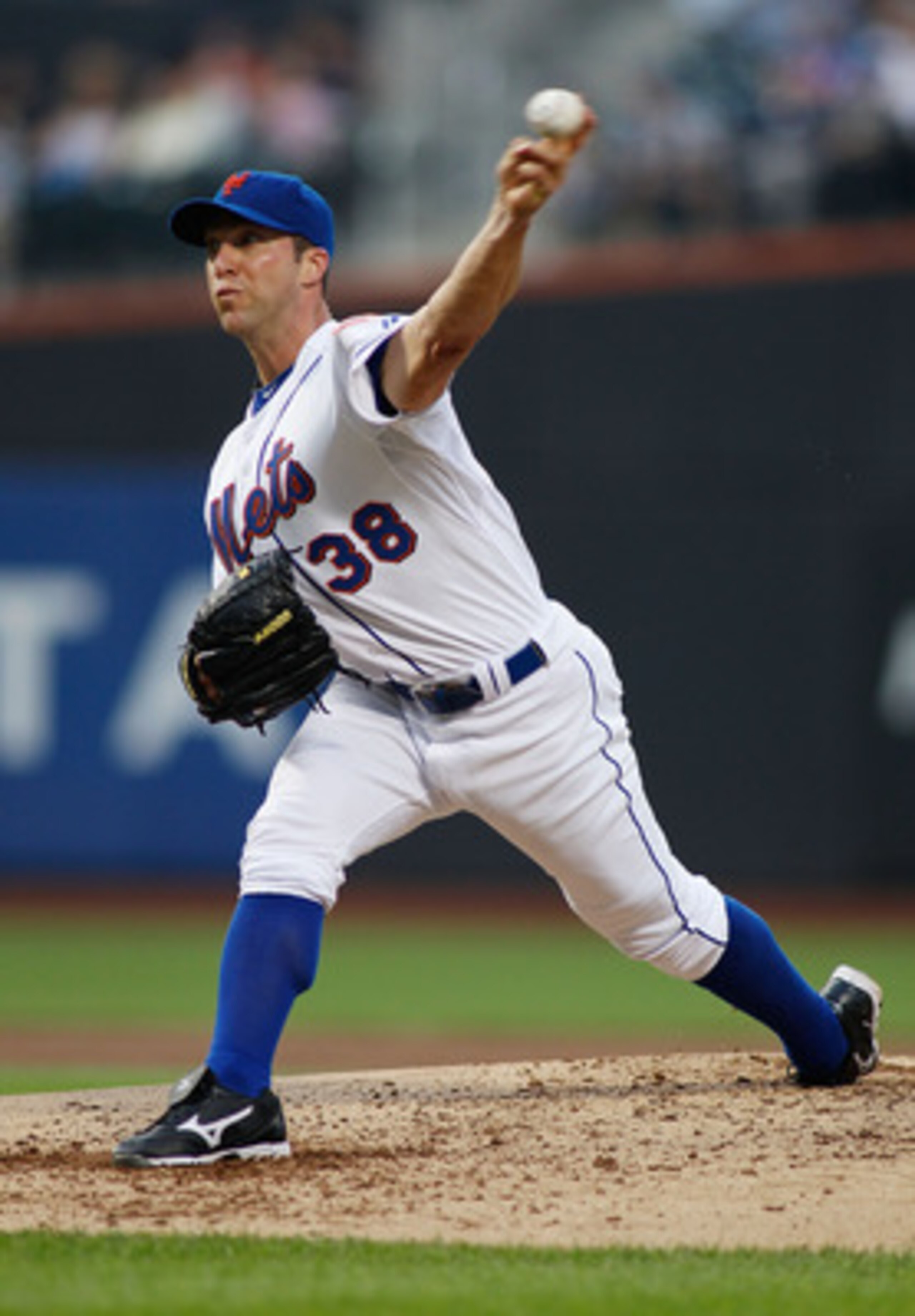 NEW YORK - JUNE 01:  Chris Capuano #38 of the New York Mets delivers a pitch in the third inning against the Pittsburgh Pirates on June 1, 2011 at Citi Field in the Flushing neighborhood of the Queens borough of New York City.  (Photo by Mike Stobe/Getty