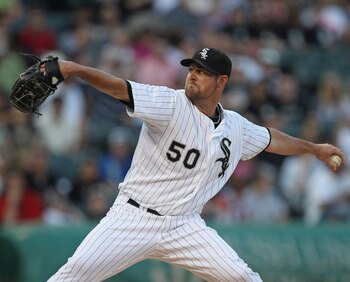 CHICAGO, IL - JUNE 06:  Starting pitcher John Danks #50 of the Chicago White Sox delivers the ball against the Seattle Mariners at U.S. Cellular Field on June 6, 2011 in Chicago, Illinois. The White Sox defeated the Mariners 3-1.  (Photo by Jonathan Danie