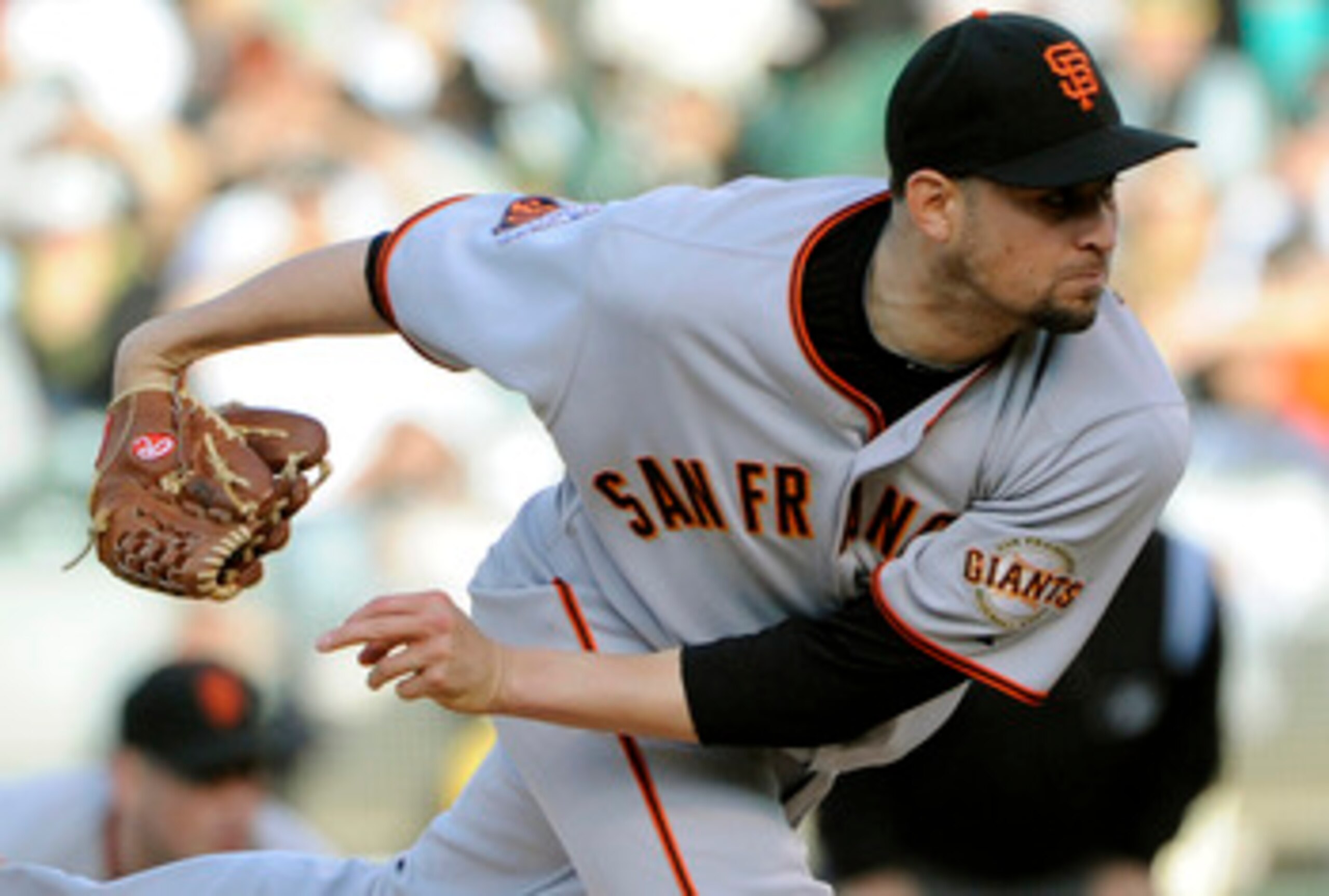 OAKLAND, CA -  JUNE 18: Jonathan Sanchez #57 of the San Francisco Giants pitches in the first inning against the Oakland Athletics during a MLB baseball game June 18, 2011 at the Oakland-Alameda County Coliseum in Oakland, California. (Photo by Thearon W.