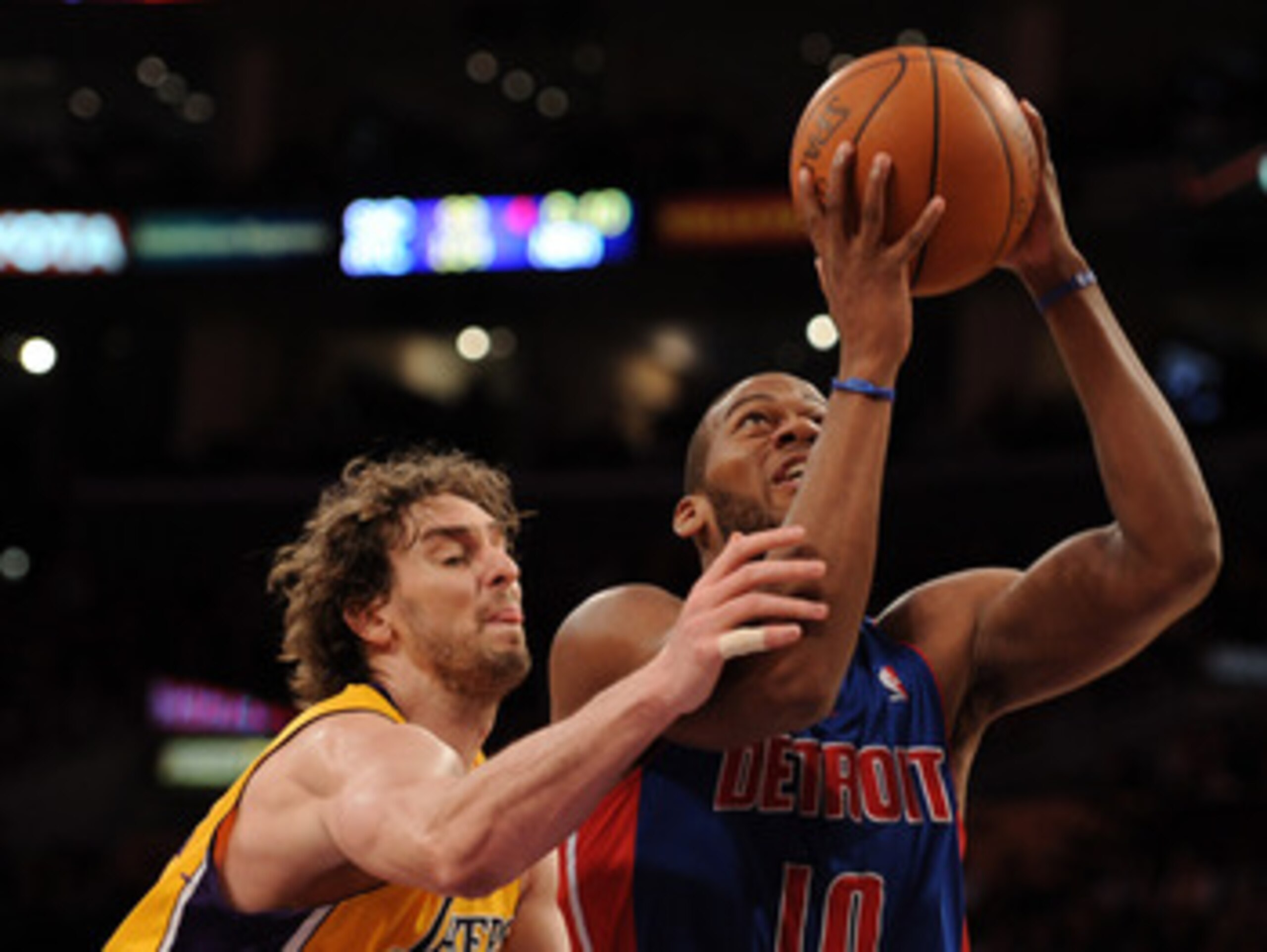 LOS ANGELES, CA - JANUARY 04:  Greg Monroe #10 of the Detroit Pistons takes a shot in front of Pau Gasol #16 of the Los Angeles Lakers during a 108-83 Laker win at the Staples Center on January 4, 2011 in Los Angeles, California. NOTE TO USER: User expres