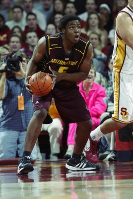 LOS ANGELES - JANUARY 18:  Ike Diogu #5 of the Arizona State University Sun Devils holds the ball during the game against the University of Southern California Trojans at the Los Angeles Sports Arena on January 18, 2003 in Los Angeles, California.  USC wo