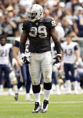 OAKLAND, CA - SEPTEMBER 19:  Lamarr Houston #99 of the Oakland Raiders in action during their game against the St. Louis Rams at the Oakland-Alameda County Coliseum on September 19, 2010 in Oakland, California.  (Photo by Ezra Shaw/Getty Images)