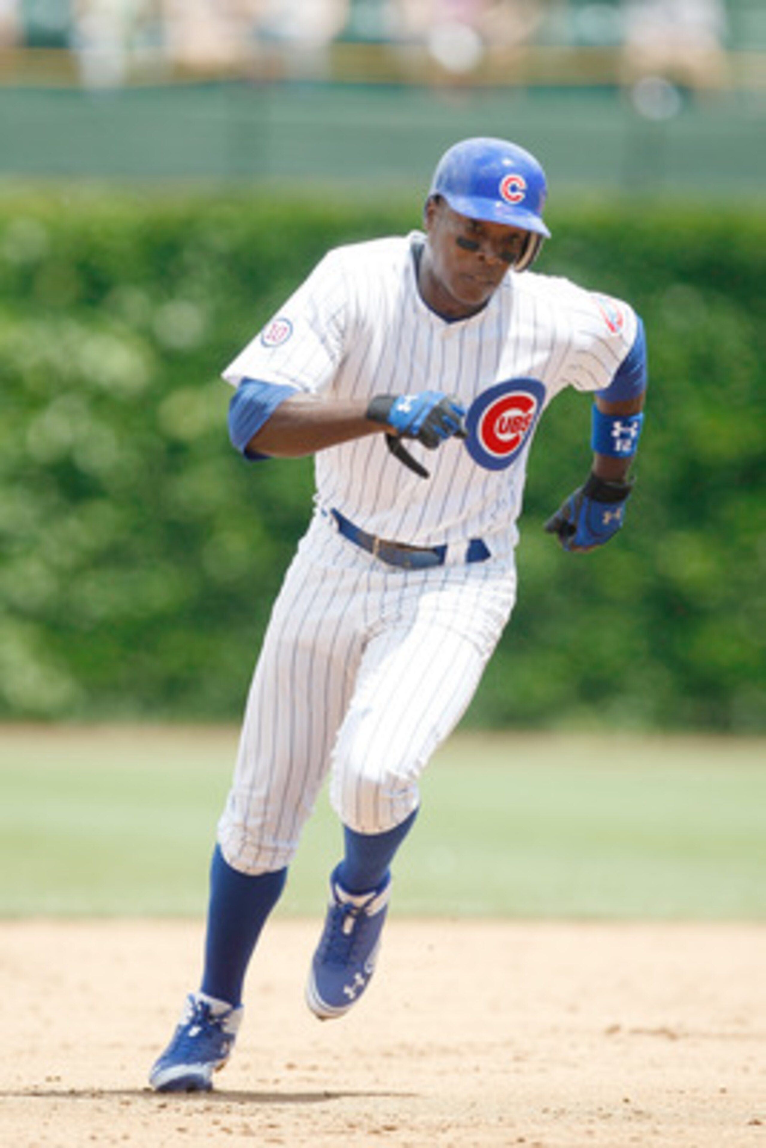 CHICAGO, IL - JUNE 16: Alfonso Soriano #13 of the Chicago Cubs runs against the Milwaukee Brewers at Wrigley Field on June 16, 2011 in Chicago, Illinois. (Photo by Scott Boehm/Getty Images)