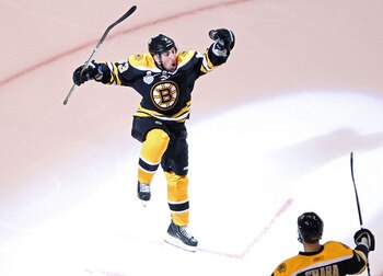 BOSTON, MA - JUNE 13:  Brad Marchand #63 of the Boston Bruins celebrates after scoring a goal in the first period against Roberto Luongo #1 of the Vancouver Canucks during Game Six of the 2011 NHL Stanley Cup Final at TD Garden on June 13, 2011 in Boston,