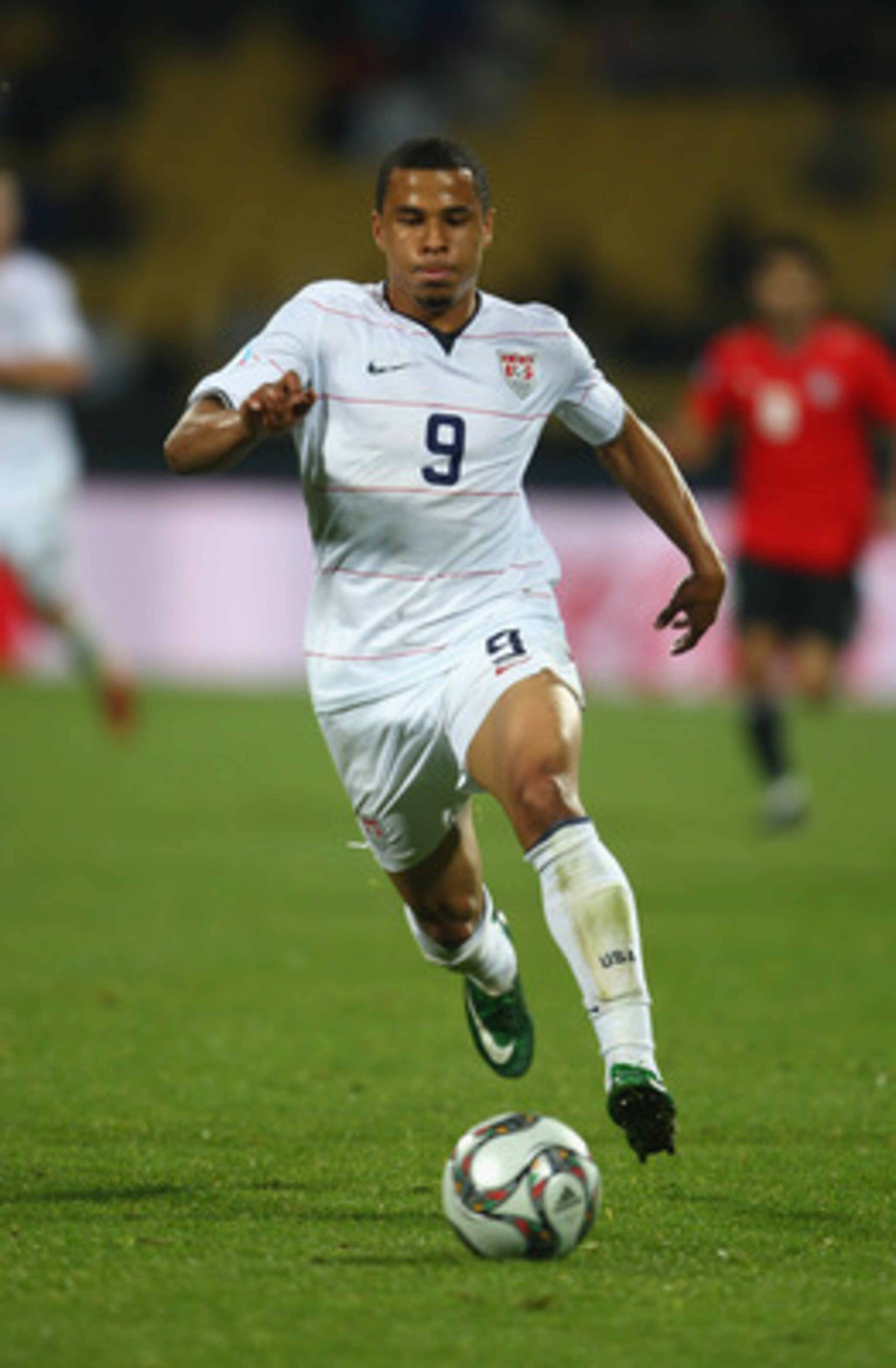 RUSTENBURG, SOUTH AFRICA - JUNE 21:  Charlie Davies of USA runs with the ball during the FIFA Confederations Cup match between Egypt and USA at Royal Bafokeng Stadium on June 21, 2009 in Rustenburg, South Africa.  (Photo by Jamie McDonald/Getty Images)