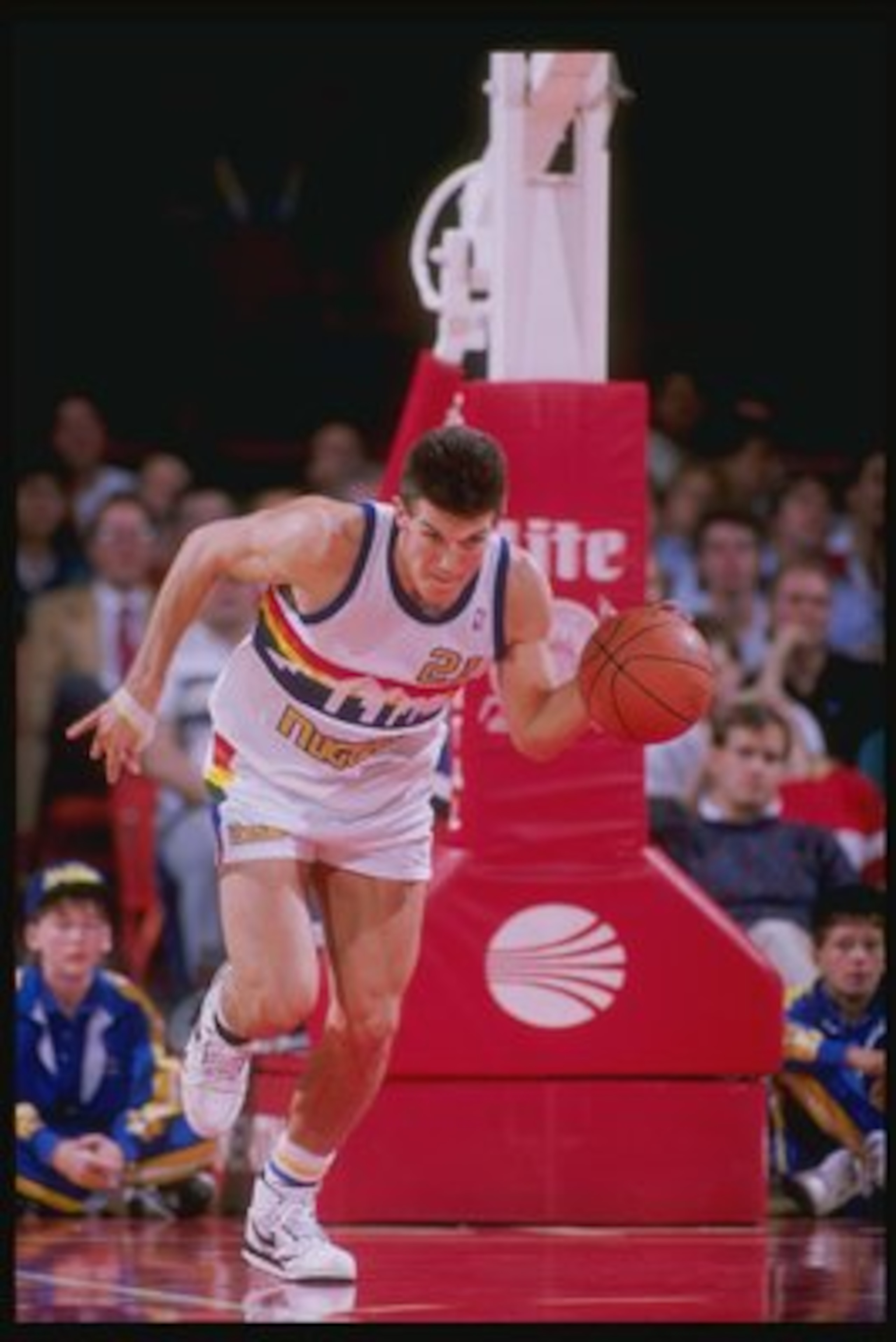 1989: Todd Lichti of the Denver Nuggets dribbles the ball down the court during a game at the McNichols Sports Arena in Denver, Colorado. Mandatory Credit: Tim de Frisco /Allsport 1989: Todd Lichti of the Denver Nuggets dribbles the ball down the court during a game at the McNichols Sports Arena in Denver, Colorado. Mandatory Credit: Tim de Frisco /Allsport