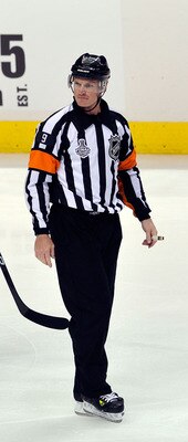 VANCOUVER, BC - JUNE 10:  Ryan Kesler #17 of the Vancouver Canucks skates past referee Dan O'Rourke #9 during Game Five of the 2011 NHL Stanley Cup Final at Rogers Arena on June 10, 2011 in Vancouver, British Columbia, Canada.  (Photo by Rich Lam/Getty Im