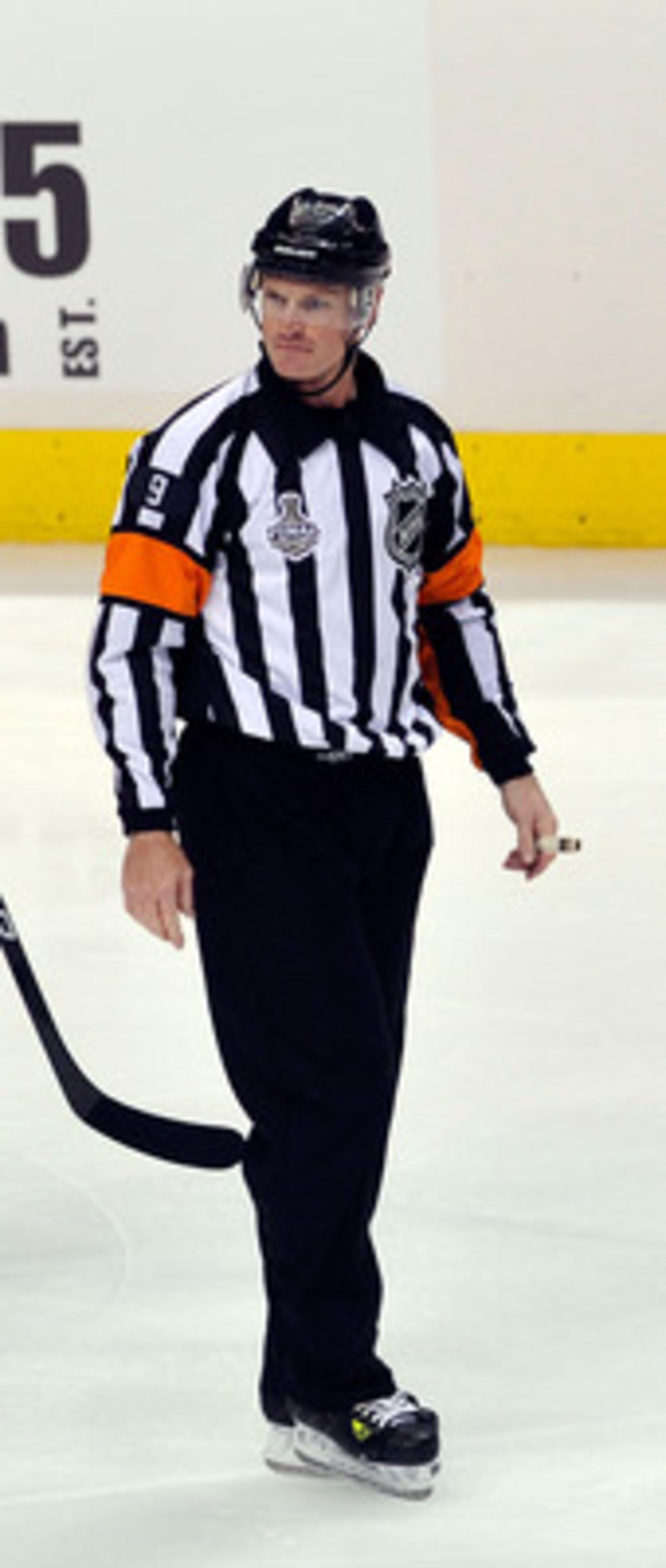VANCOUVER, BC - JUNE 10:  Ryan Kesler #17 of the Vancouver Canucks skates past referee Dan O'Rourke #9 during Game Five of the 2011 NHL Stanley Cup Final at Rogers Arena on June 10, 2011 in Vancouver, British Columbia, Canada.  (Photo by Rich Lam/Getty Im