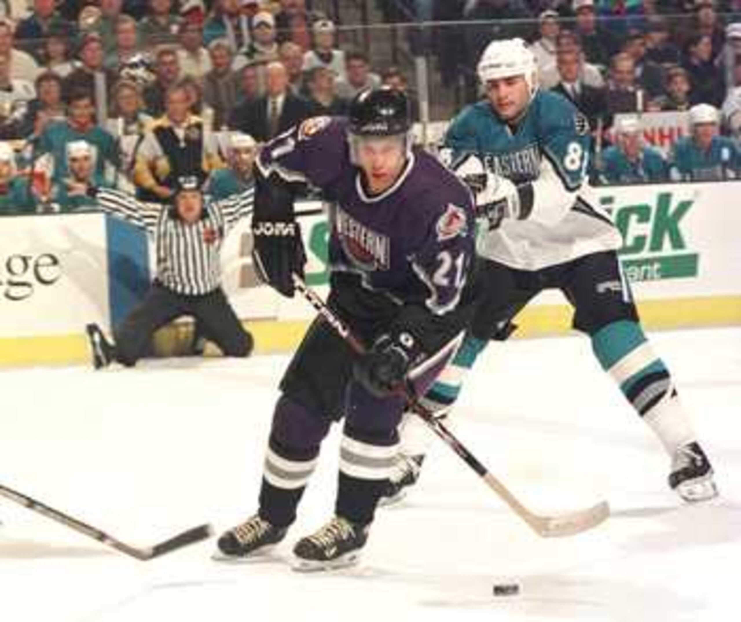 20 Jan 1996:  Peter Forsberg #21 of the Western Conference weaves through Ray Bourque #77, Roman Hamrlik #44 and Eric Lindros #88 of the Eastern Conference in an attempt at a shot during the first period of the NHL All Star Game played at the Fleet Center