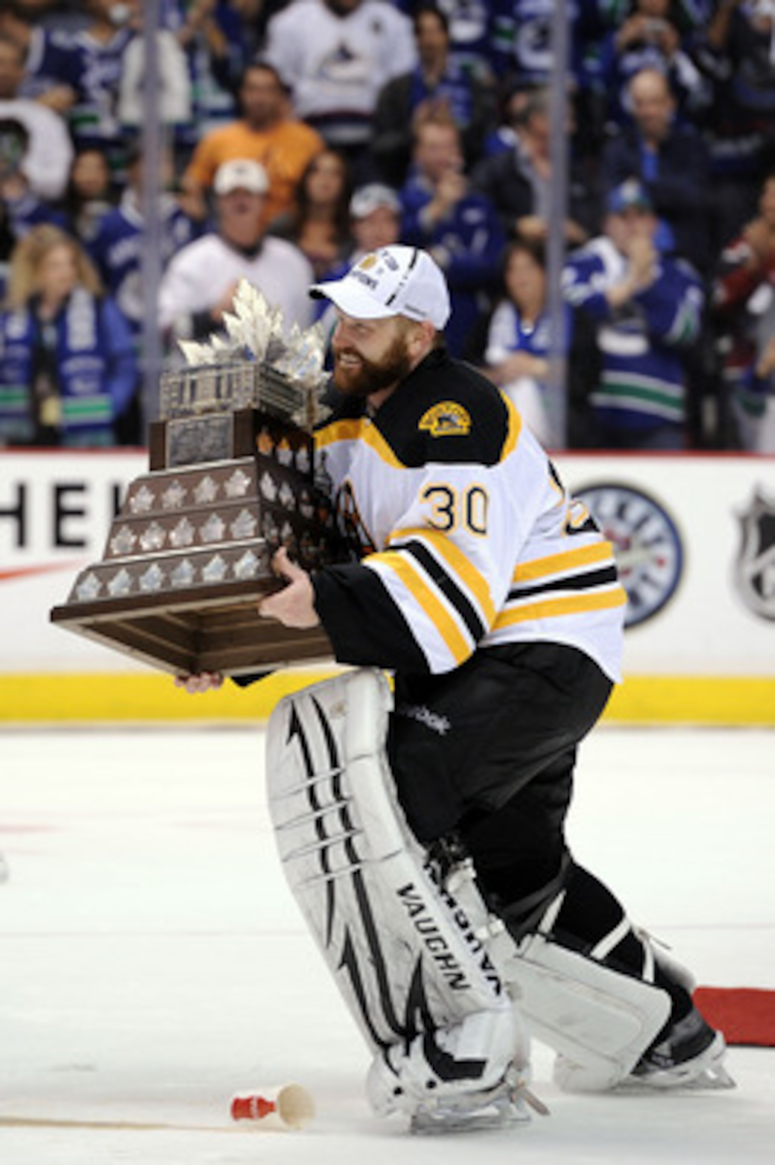 VANCOUVER, BC - JUNE 15:  Tim Thomas #30 of the Boston Bruins is awarded the Conn Smythe Trophy after defeating the Vancouver Canucks in Game Seven of the 2011 NHL Stanley Cup Final at Rogers Arena on June 15, 2011 in Vancouver, British Columbia, Canada.