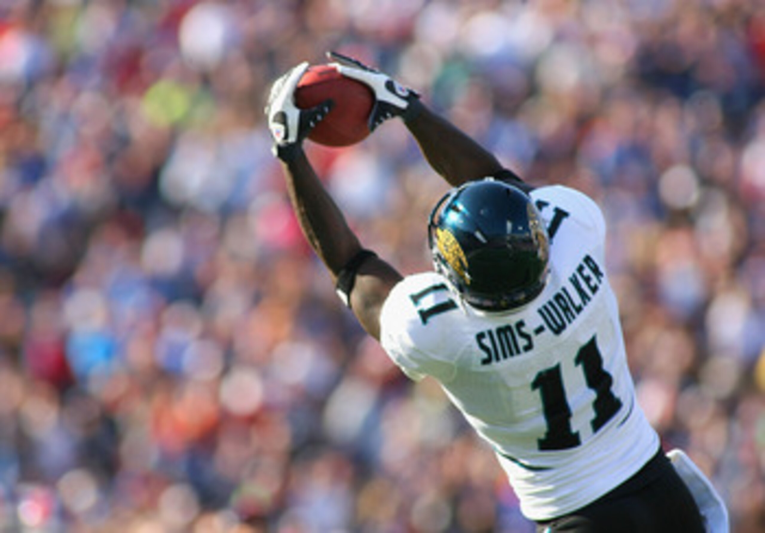ORCHARD PARK, NY - OCTOBER 10:  Mike Sims-Walker #11 of the Jacksonville Jaguars makes a catch against the Buffalo Bills   at Ralph Wilson Stadium on October 10, 2010 in Orchard Park, New York. Jacksonville won 36-26. (Photo by Rick Stewart/Getty Images)