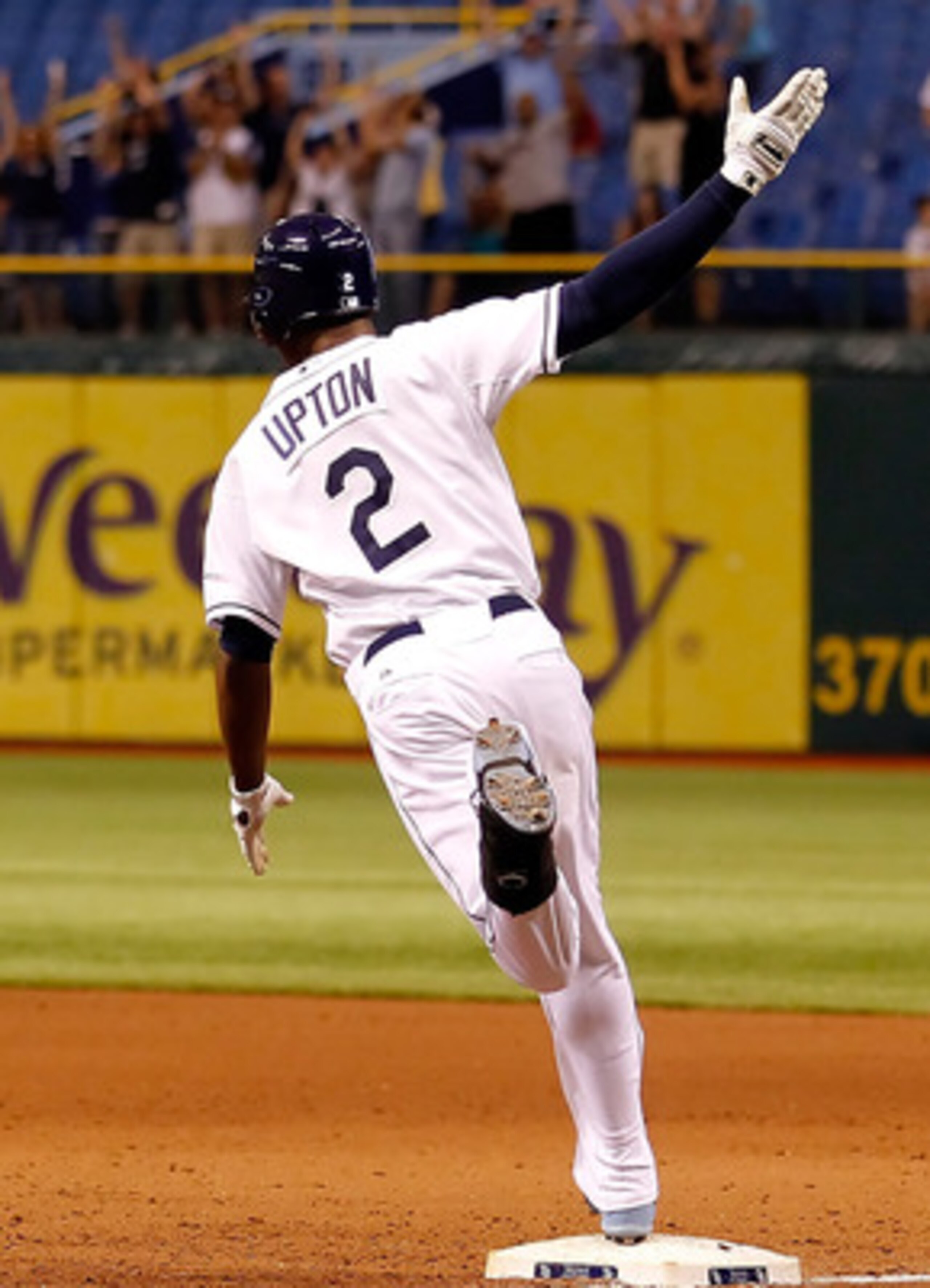 ST. PETERSBURG, FL - MAY 03: Outfielder B.J. Upton #2 of the Tampa Bay Rays celebrates his two run walkoff home run against the Toronto Blue Jays at Tropicana Field on May 3, 2011 in St. Petersburg, Florida. (Photo by J. Meric/Getty Images) ST. PETERSBURG, FL - MAY 03: Outfielder B.J. Upton #2 of the Tampa Bay Rays celebrates his two run walkoff home run against the Toronto Blue Jays at Tropicana Field on May 3, 2011 in St. Petersburg, Florida. (Photo by J. Meric/Getty Images)