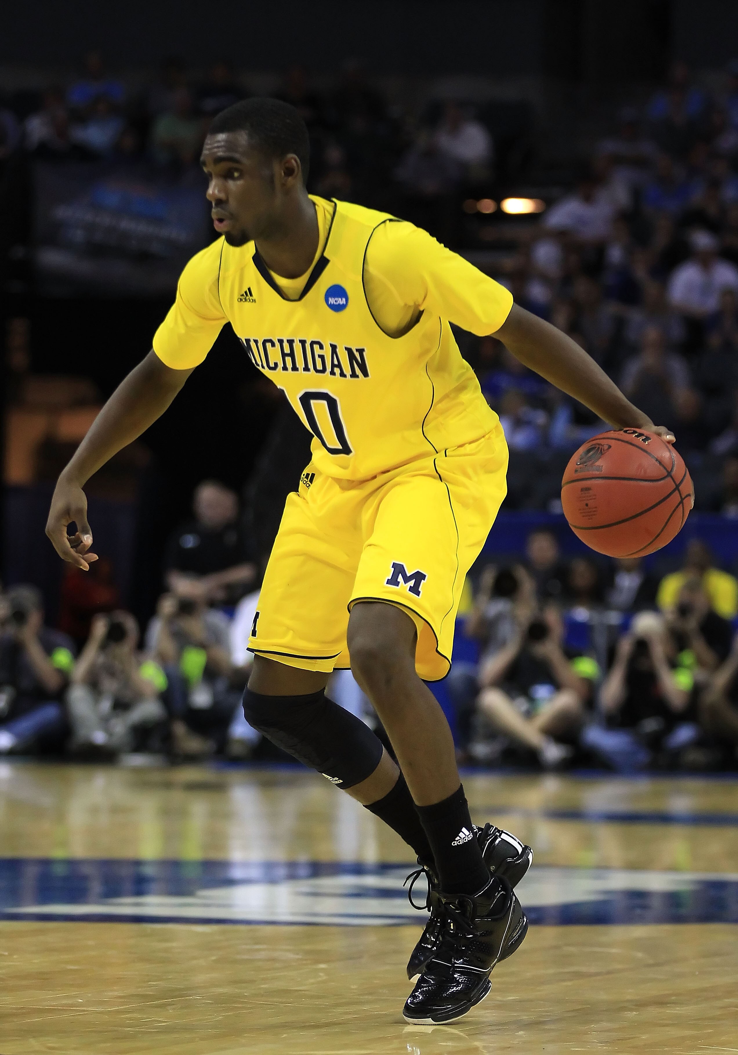 CHARLOTTE, NC - MARCH 20:  Tim Hardaway Jr. #10 of the Michigan Wolverines moves the ball while taking on the Duke Blue Devils during the third round of the 2011 NCAA men's basketball tournament at Time Warner Cable Arena on March 20, 2011 in Charlotte, N