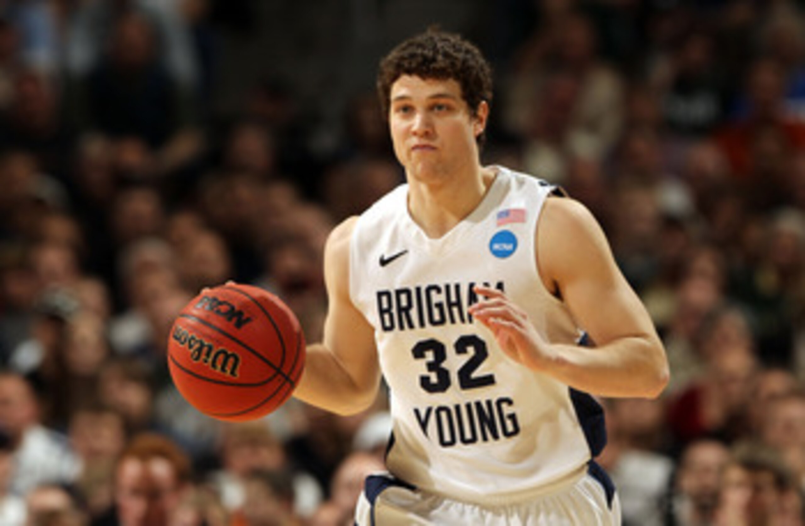 DENVER, CO - MARCH 19: Jimmer Fredette #32 of the Brigham Young Cougars handles the ball against the Gonzaga Bulldogs during the third round of the 2011 NCAA men's basketball tournament at Pepsi Center on March 19, 2011 in Denver, Colorado. (Photo by Do DENVER, CO - MARCH 19: Jimmer Fredette #32 of the Brigham Young Cougars handles the ball against the Gonzaga Bulldogs during the third round of the 2011 NCAA men's basketball tournament at Pepsi Center on March 19, 2011 in Denver, Colorado. (Photo by Do