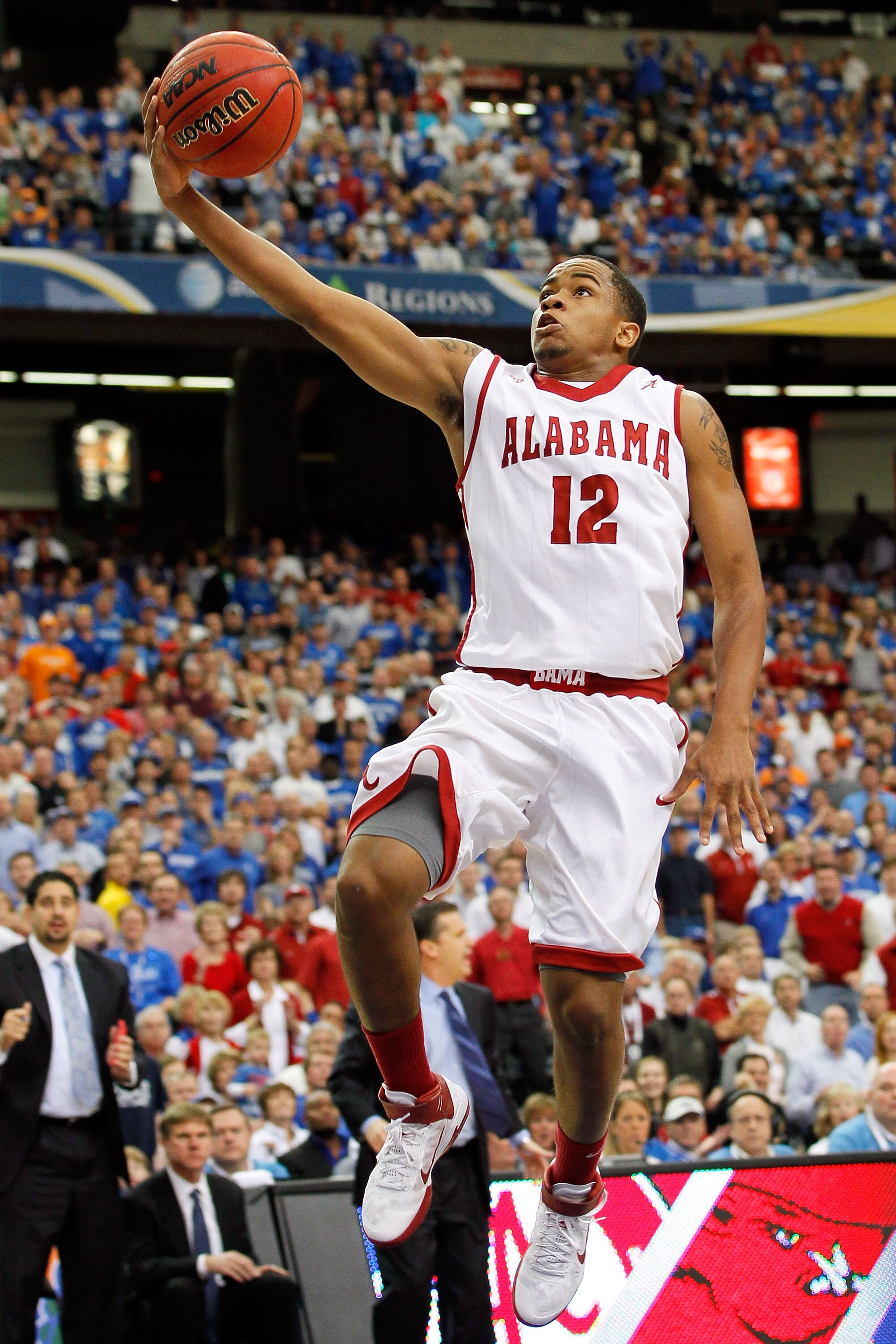 ATLANTA, GA - MARCH 12:  Trevor Releford #12 of the Alabama Crimson Tide shoots against the Kentucky Wildcats during the semifinals of the SEC Men's Basketball Tournament at Georgia Dome on March 12, 2011 in Atlanta, Georgia.  (Photo by Kevin C. Cox/Getty