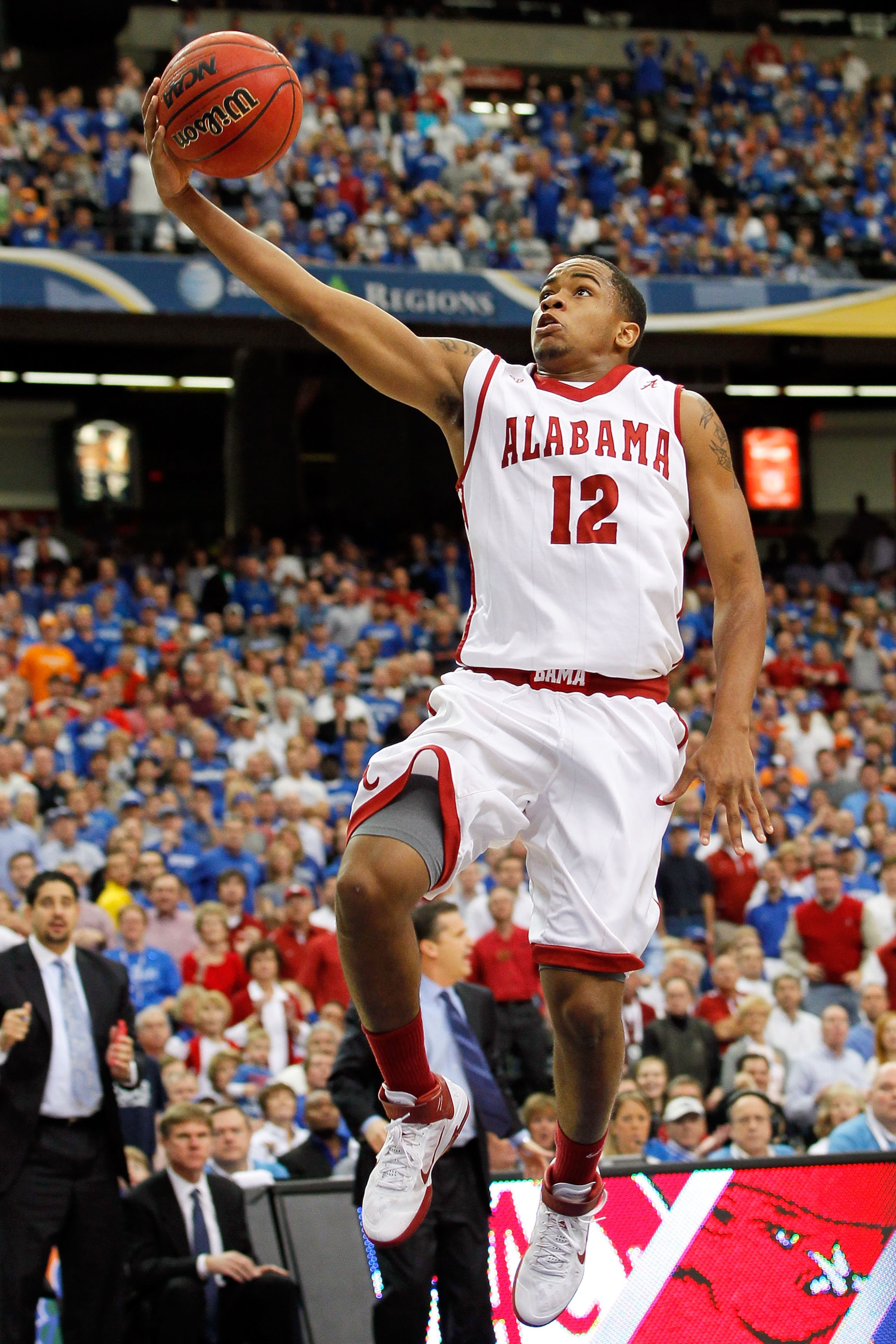 ATLANTA, GA - MARCH 12:  Trevor Releford #12 of the Alabama Crimson Tide shoots against the Kentucky Wildcats during the semifinals of the SEC Men's Basketball Tournament at Georgia Dome on March 12, 2011 in Atlanta, Georgia.  (Photo by Kevin C. Cox/Getty